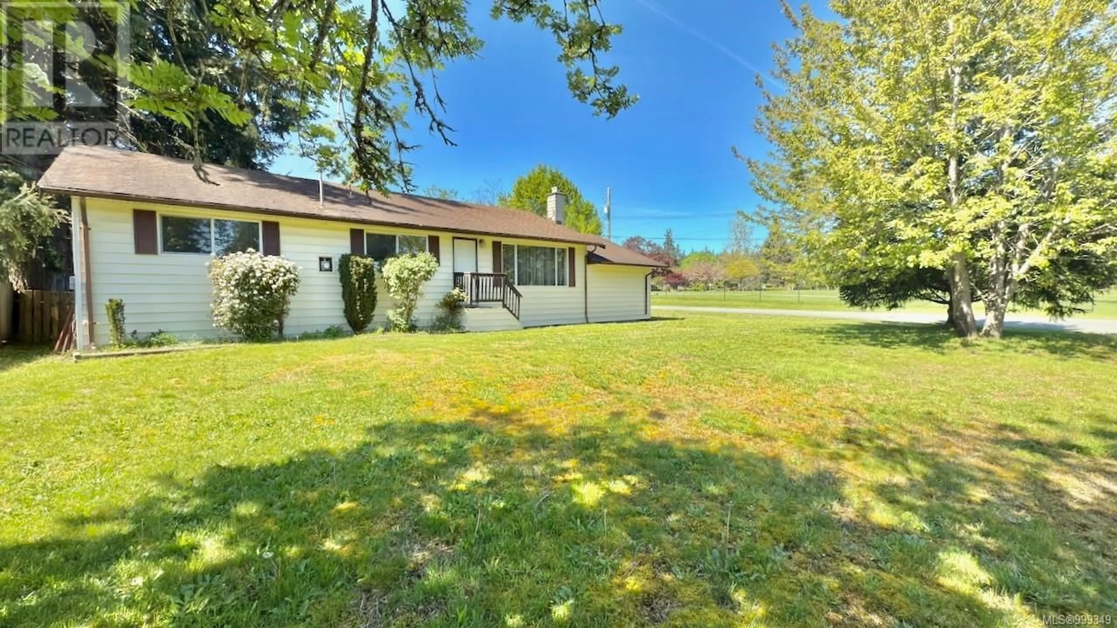 A pic from outside/outdoor area/front of a property/back of a property/a pic from drone, water/lake/river/ocean view for 2891 POPLAR DRIVE, Courtenay British Columbia V9M6A9