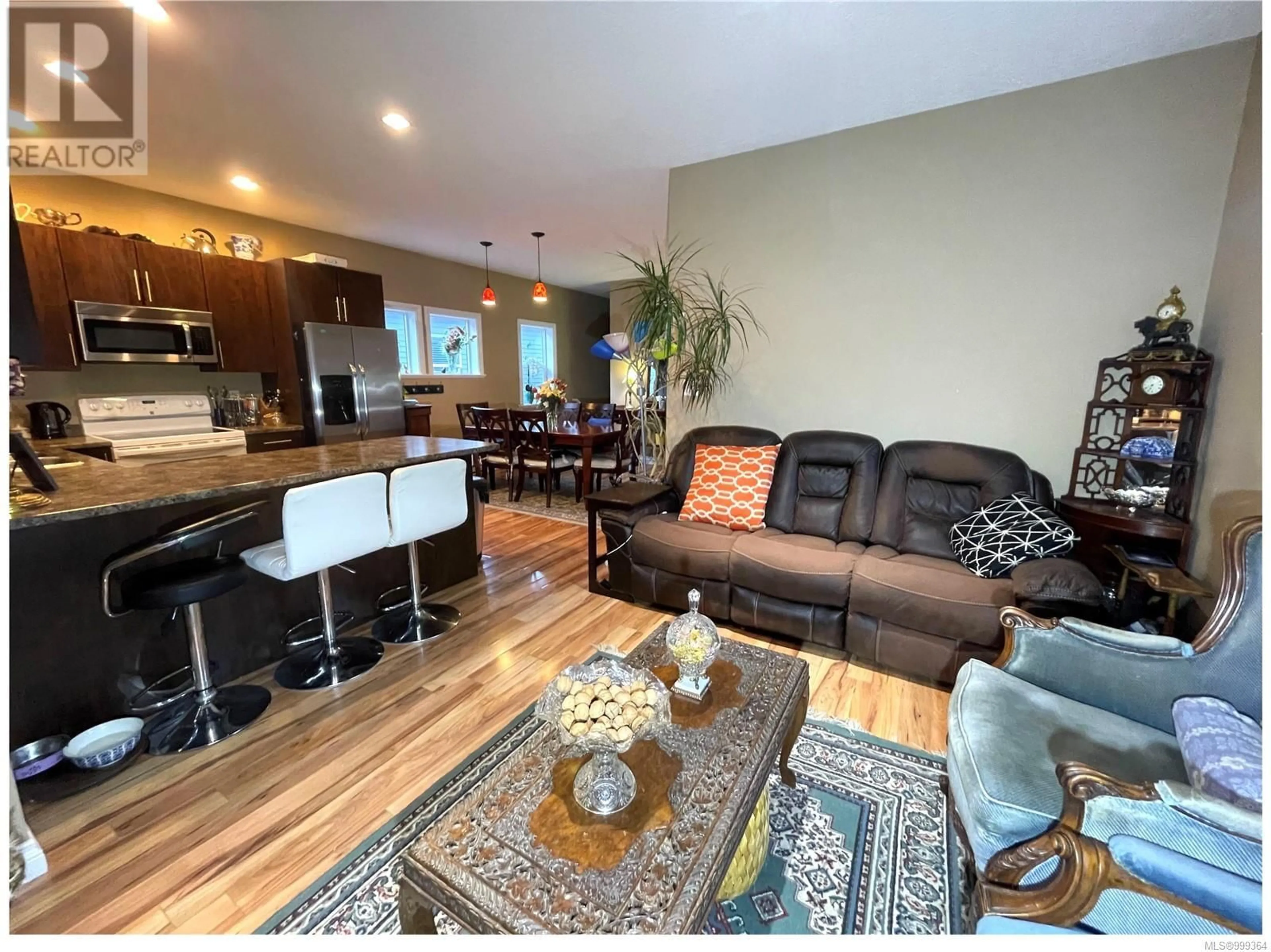 Living room with furniture, wood/laminate floor for 887 WILD RIDGE WAY, Langford British Columbia V9C0H1