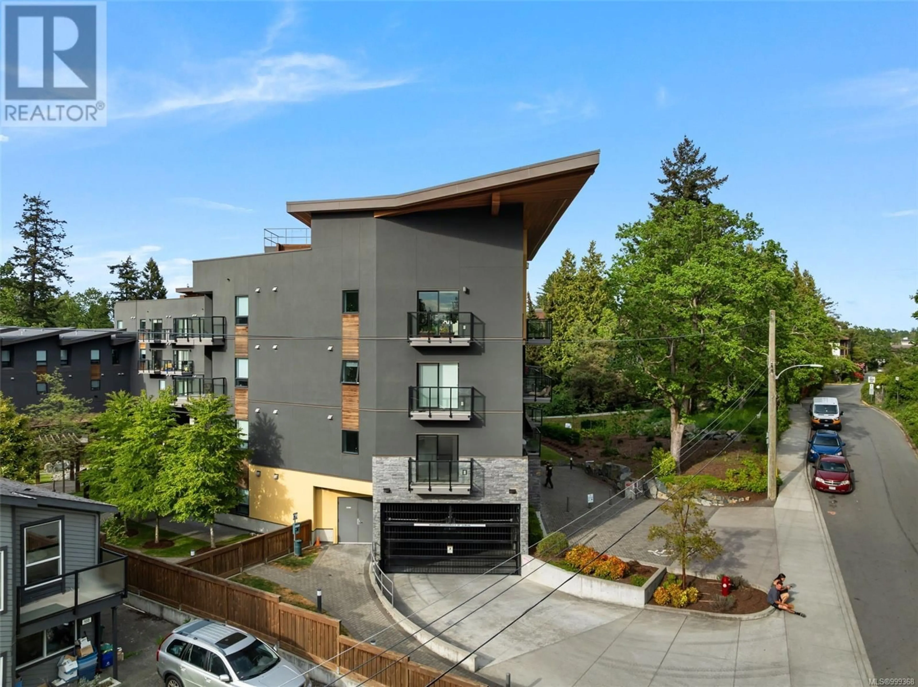 A pic from outside/outdoor area/front of a property/back of a property/a pic from drone, unknown for 207 - 991 MCKENZIE AVENUE, Saanich British Columbia V8X3G8