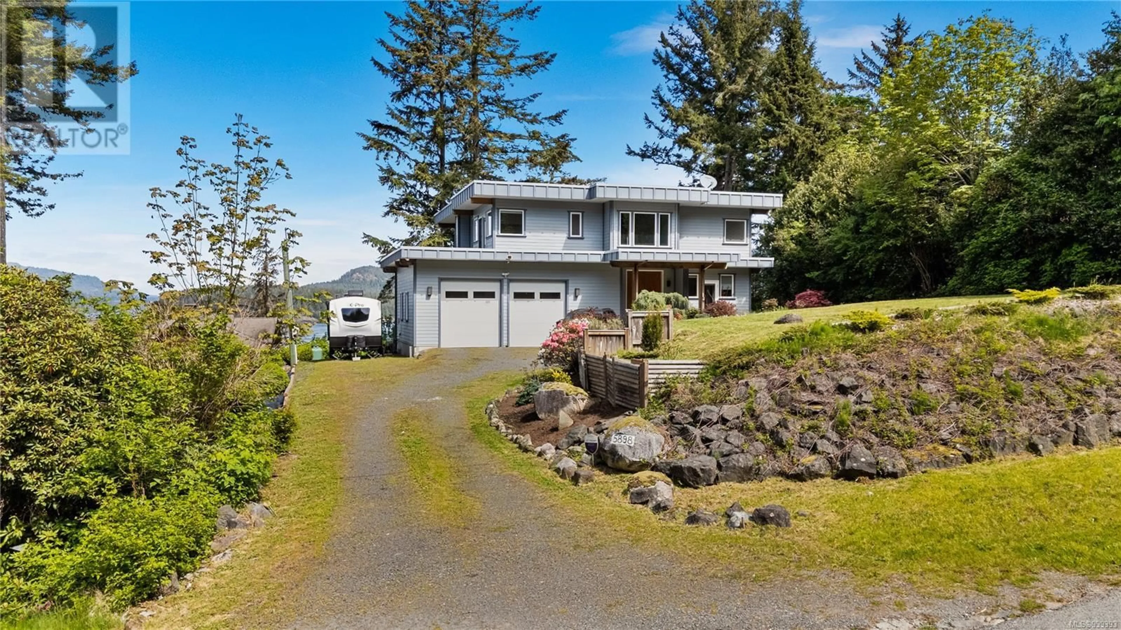 A pic from outside/outdoor area/front of a property/back of a property/a pic from drone, water/lake/river/ocean view for 5898 RACE POINT ROAD, Campbell River British Columbia V9H1N7