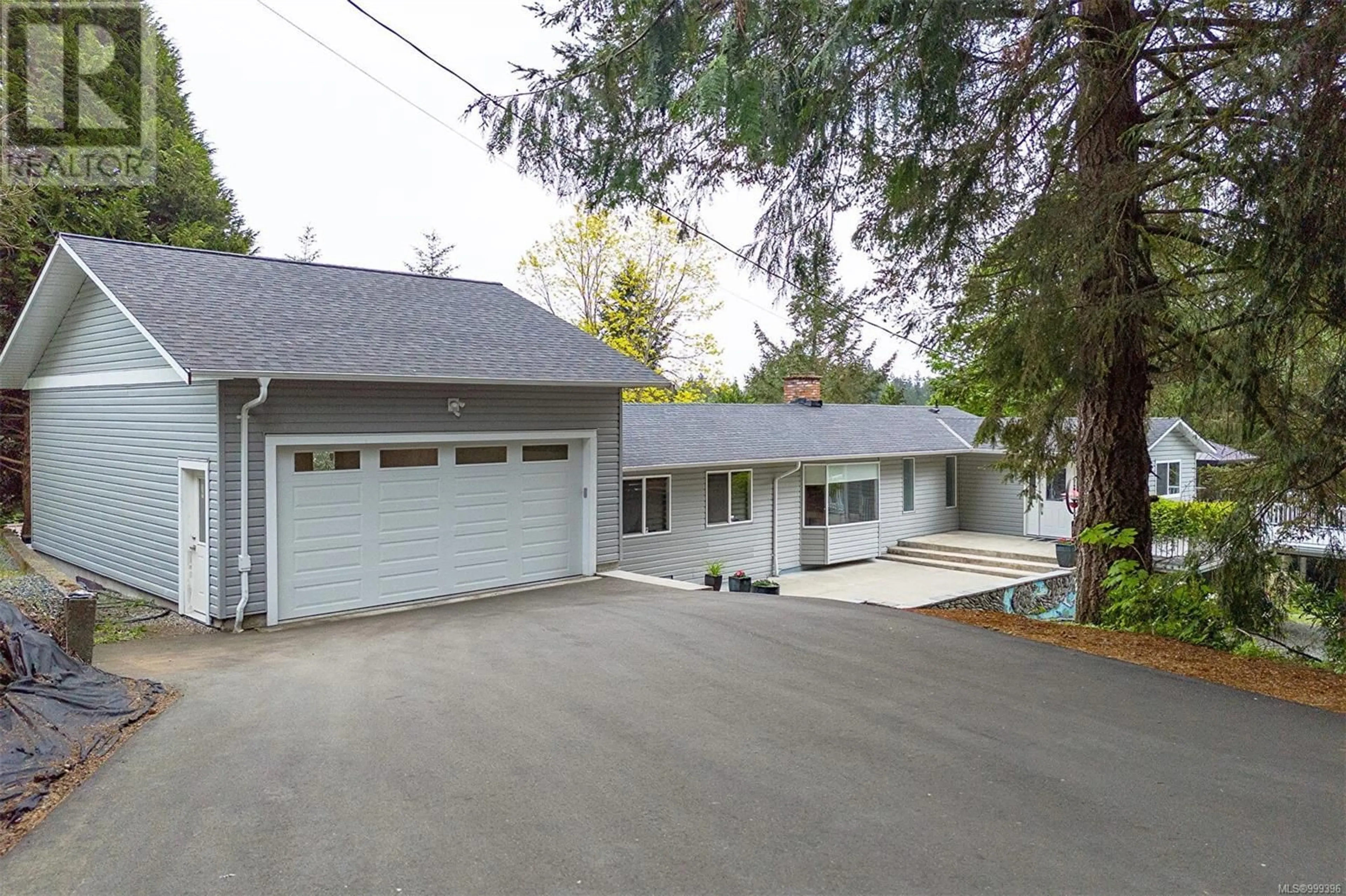A pic from outside/outdoor area/front of a property/back of a property/a pic from drone, street for 2100 CINNABAR DRIVE, Nanaimo British Columbia V9X1B3