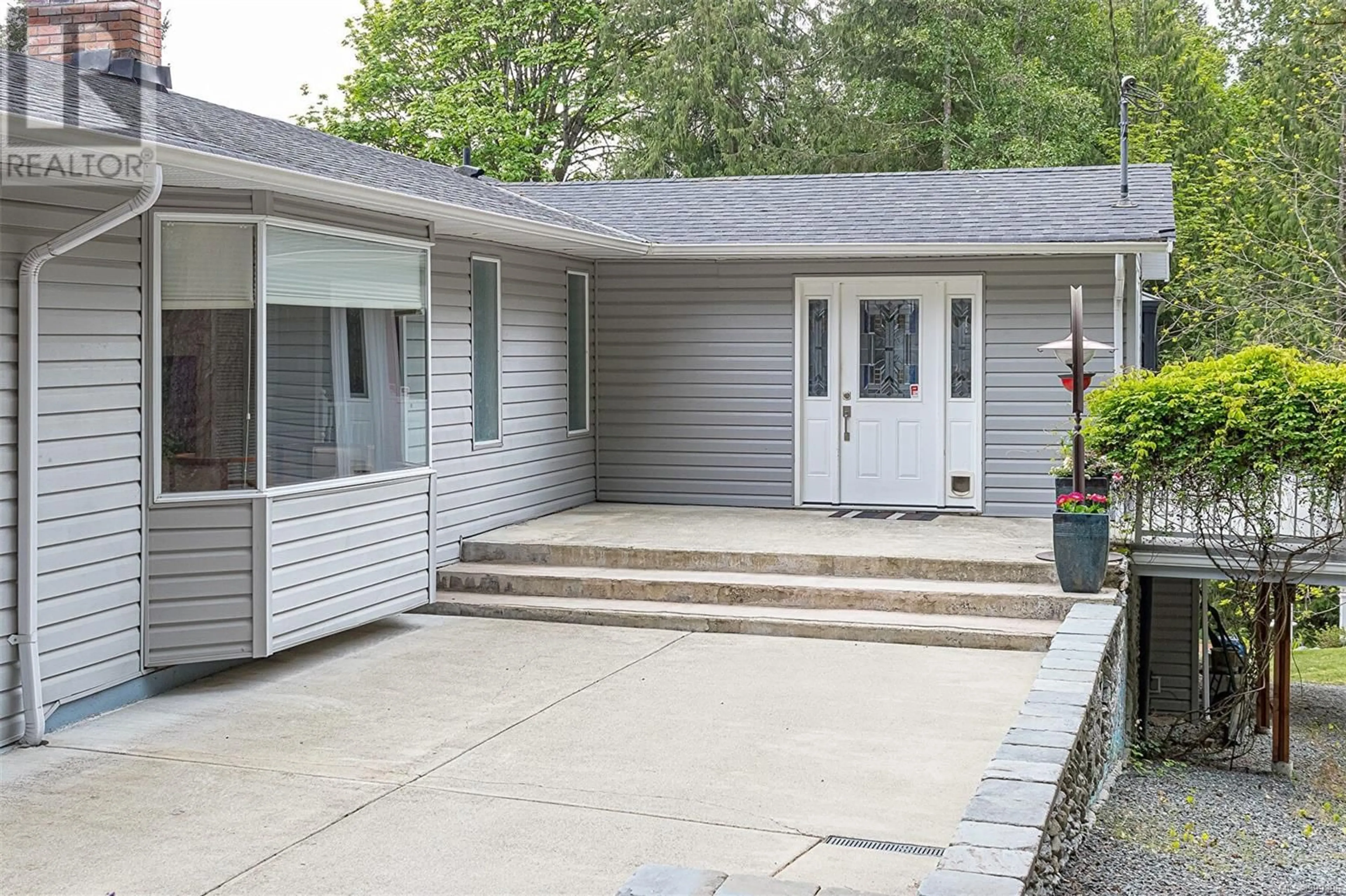 Home with vinyl exterior material, street for 2100 CINNABAR DRIVE, Nanaimo British Columbia V9X1B3