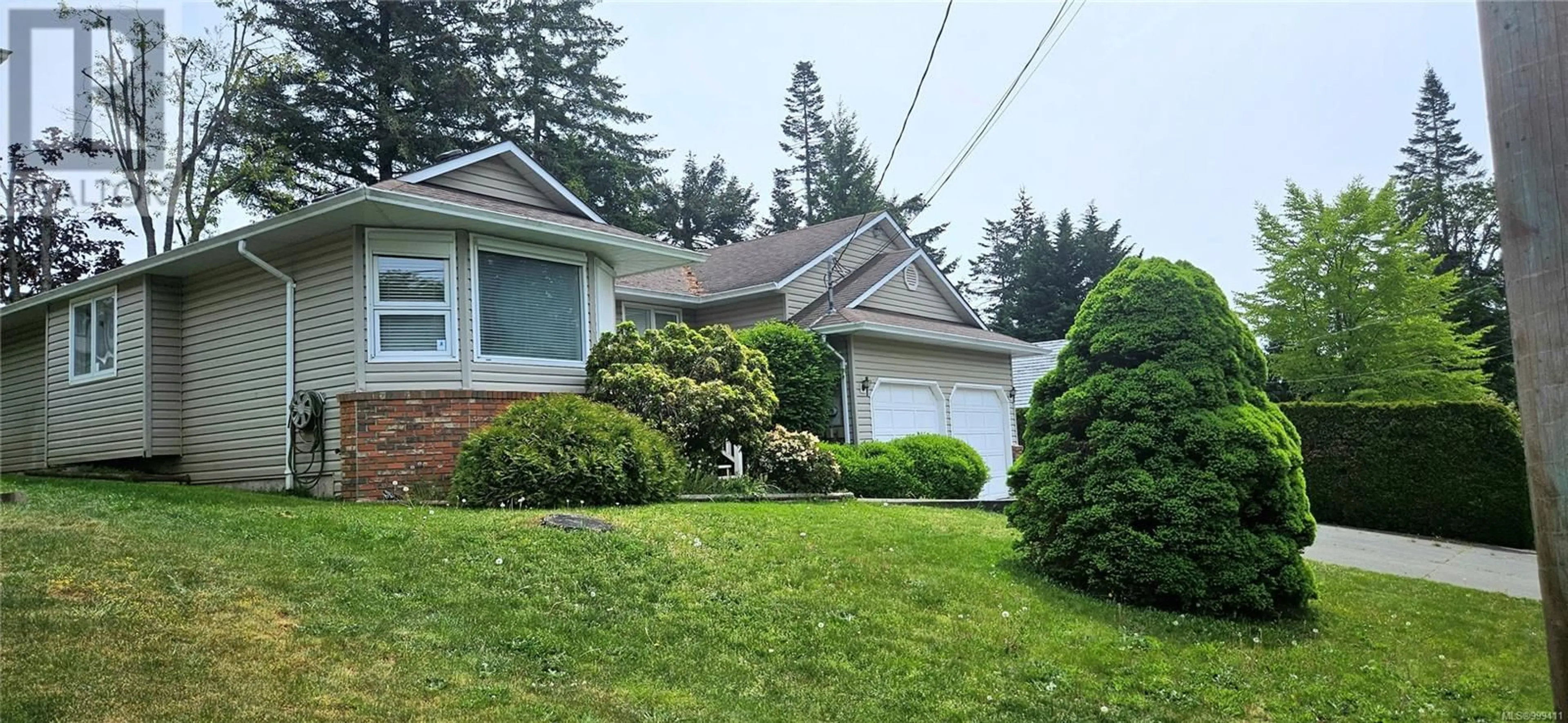 Home with vinyl exterior material, street for 666 TOTEM CRESCENT, Comox British Columbia V9M3J3