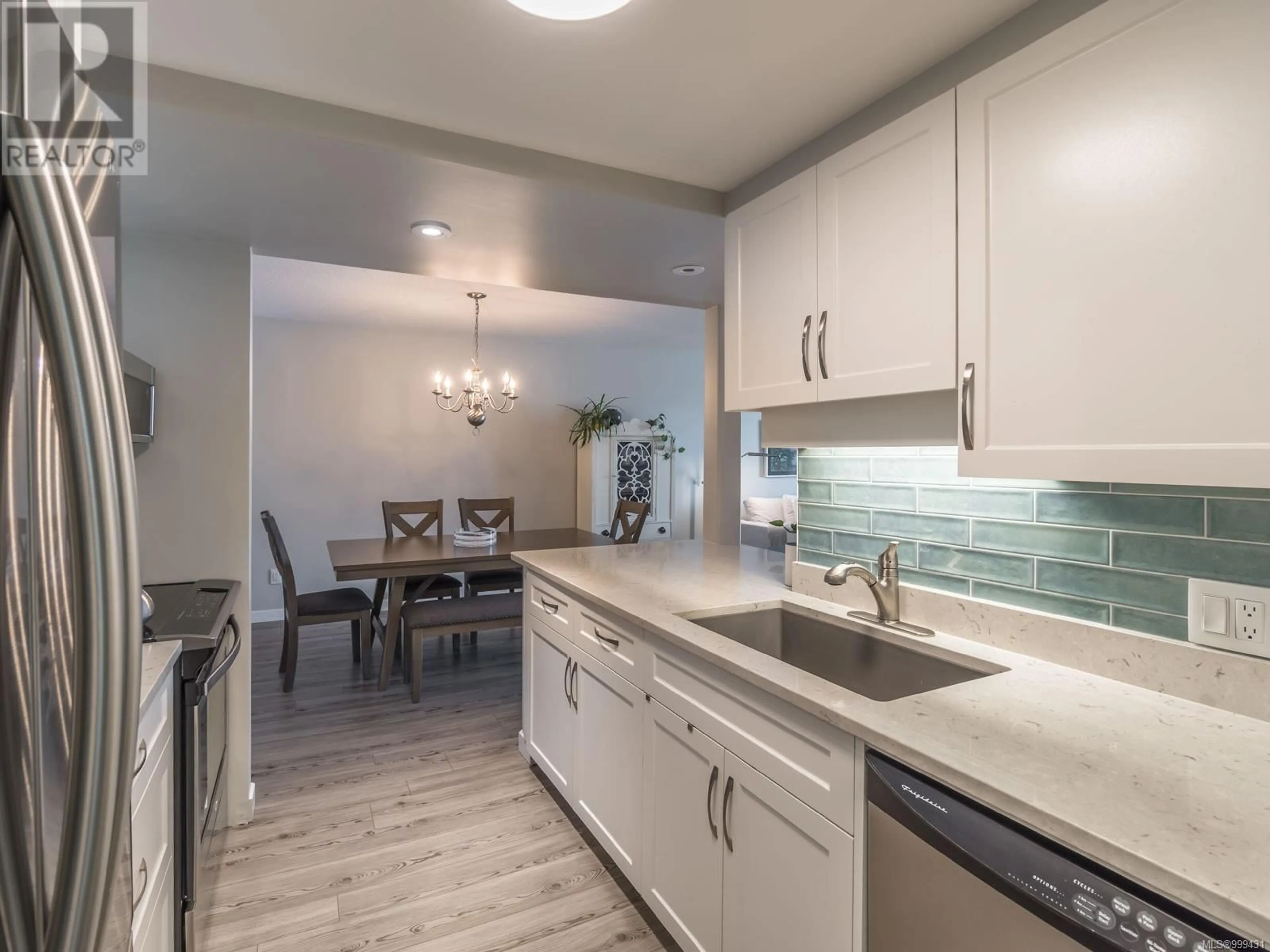Open concept kitchen, ceramic/tile floor for 404 - 3555 OUTRIGGER ROAD, Nanoose Bay British Columbia V9P9K1
