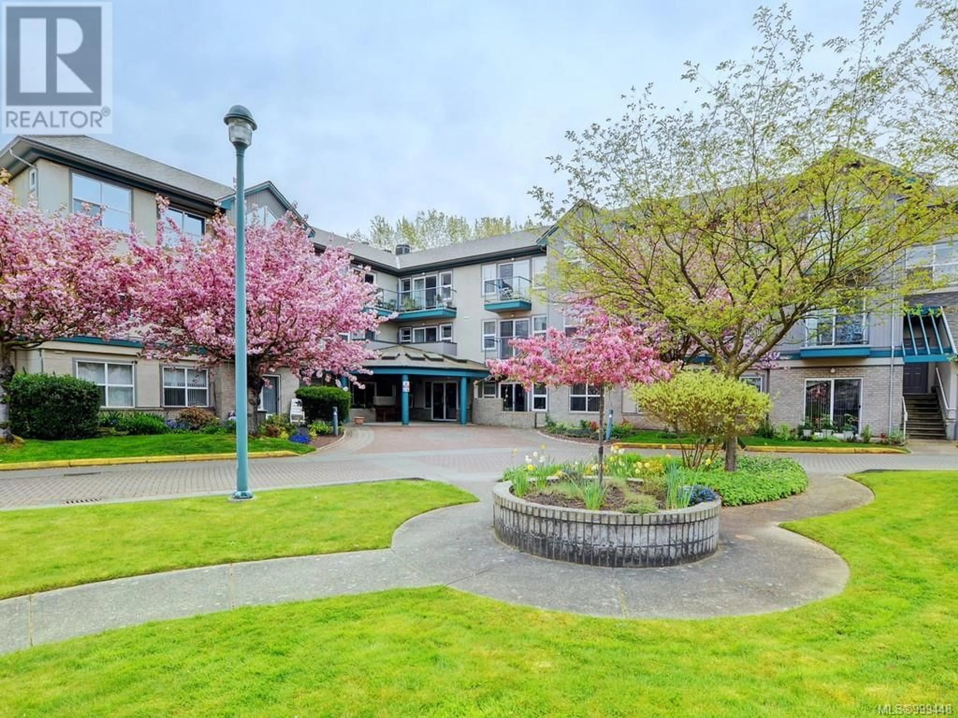 A pic from outside/outdoor area/front of a property/back of a property/a pic from drone, unknown for 105 - 1485 GARNET ROAD, Saanich British Columbia V8P5T5