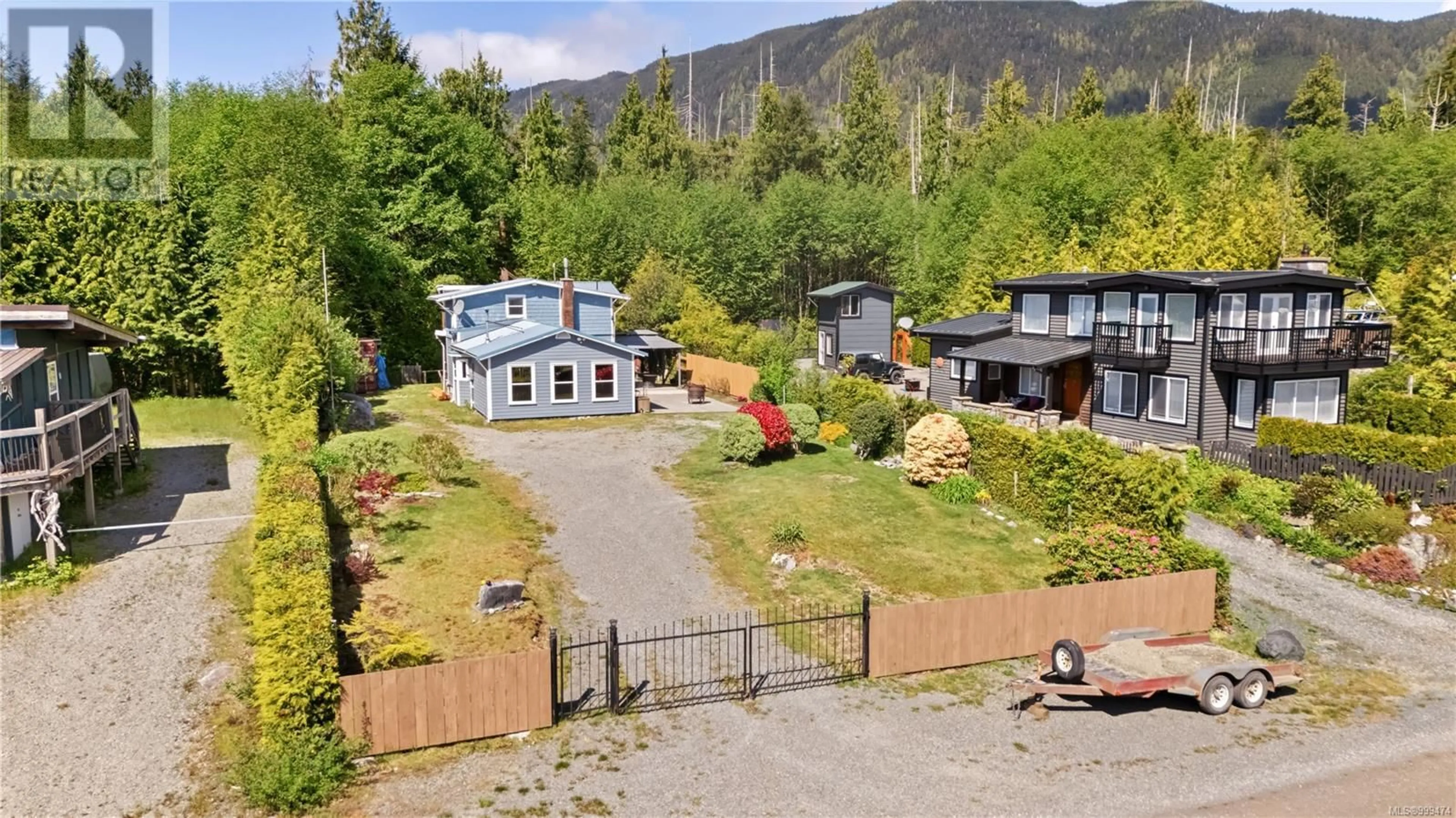 A pic from outside/outdoor area/front of a property/back of a property/a pic from drone, mountain view for 1065 SEVENTH AVENUE, Ucluelet British Columbia V0R3A0
