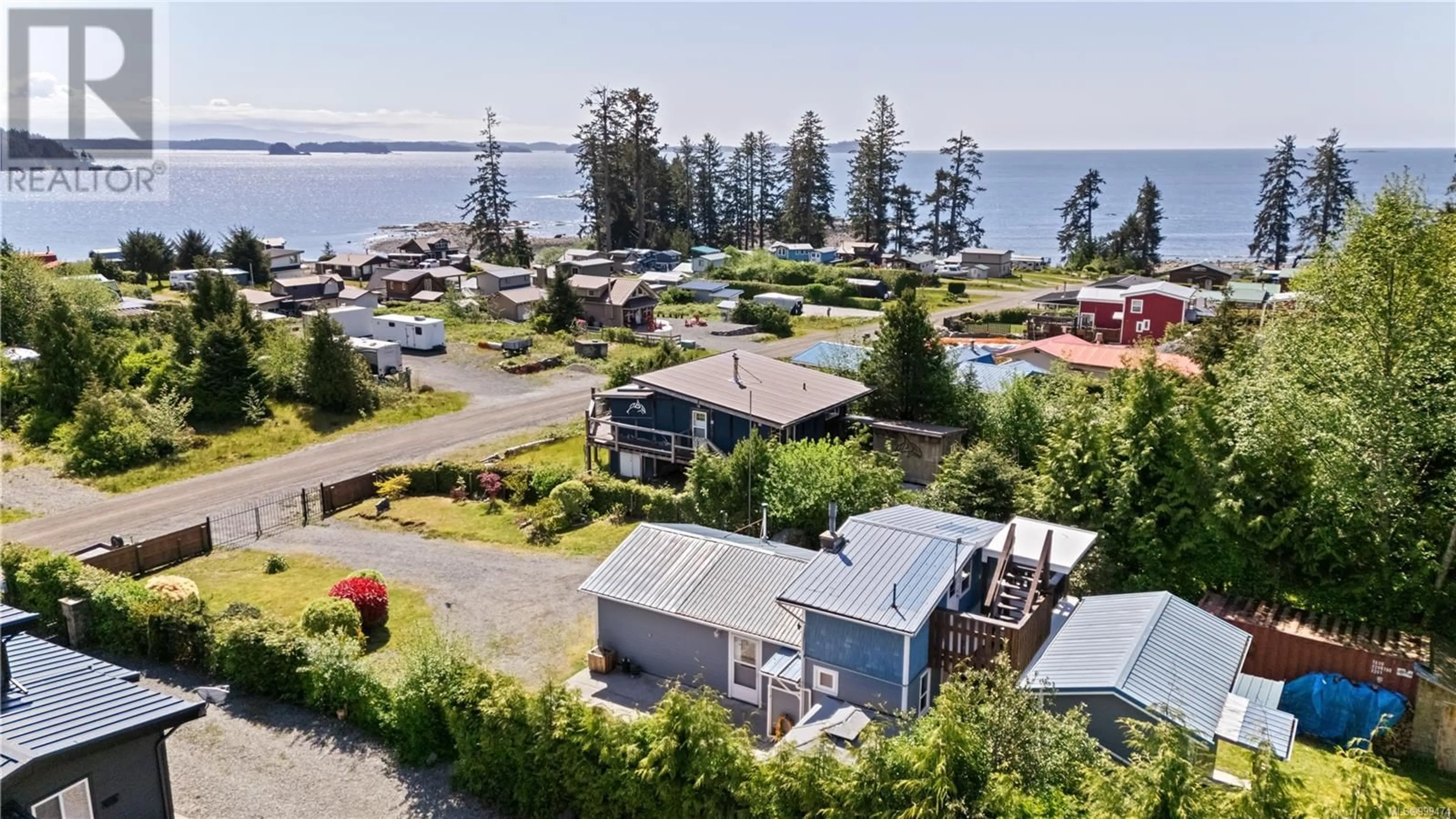 A pic from outside/outdoor area/front of a property/back of a property/a pic from drone, water/lake/river/ocean view for 1065 SEVENTH AVENUE, Ucluelet British Columbia V0R3A0