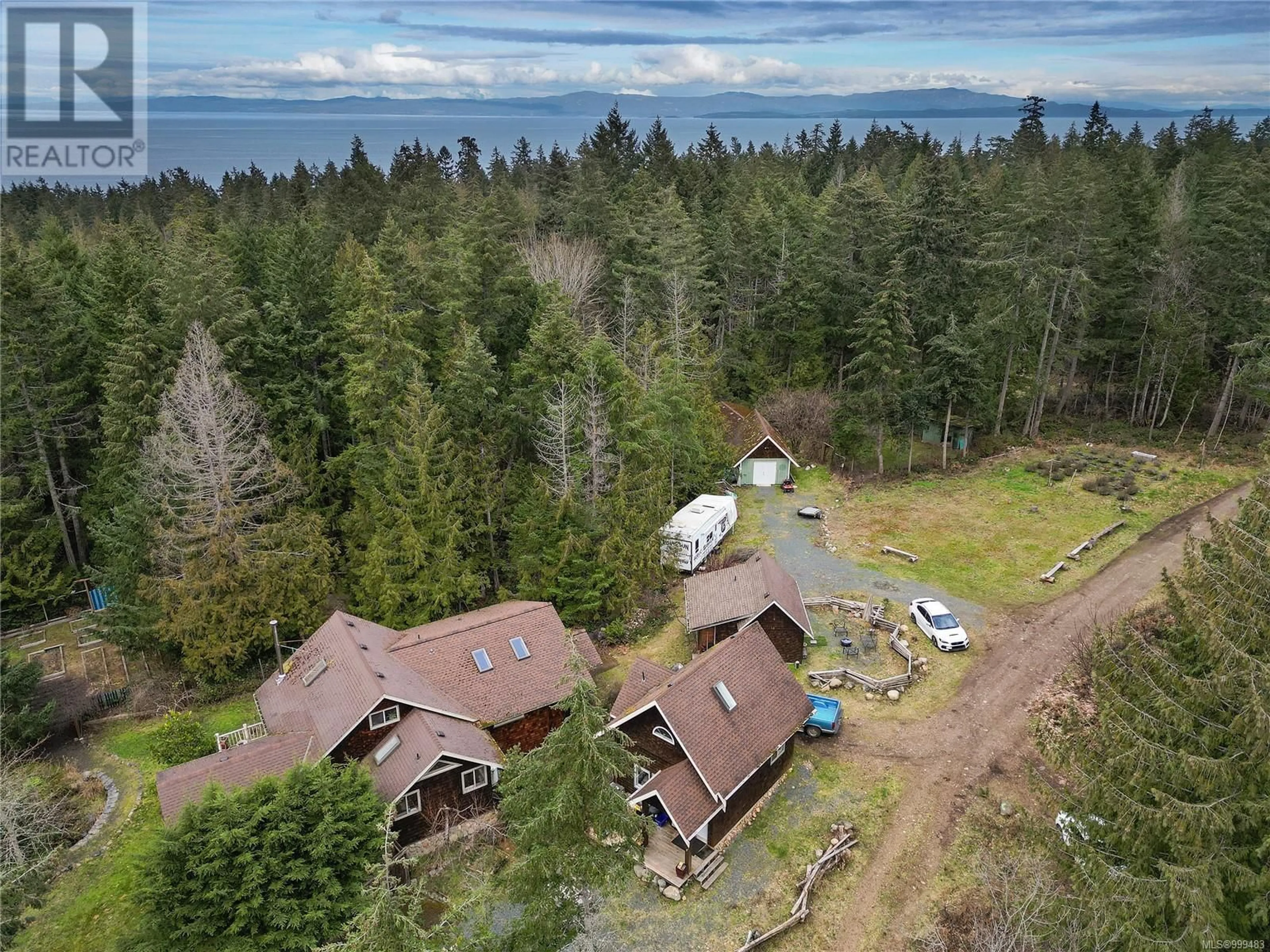 A pic from outside/outdoor area/front of a property/back of a property/a pic from drone, forest/trees view for 300 BONSAI PLACE, Qualicum Beach British Columbia V9K2A6
