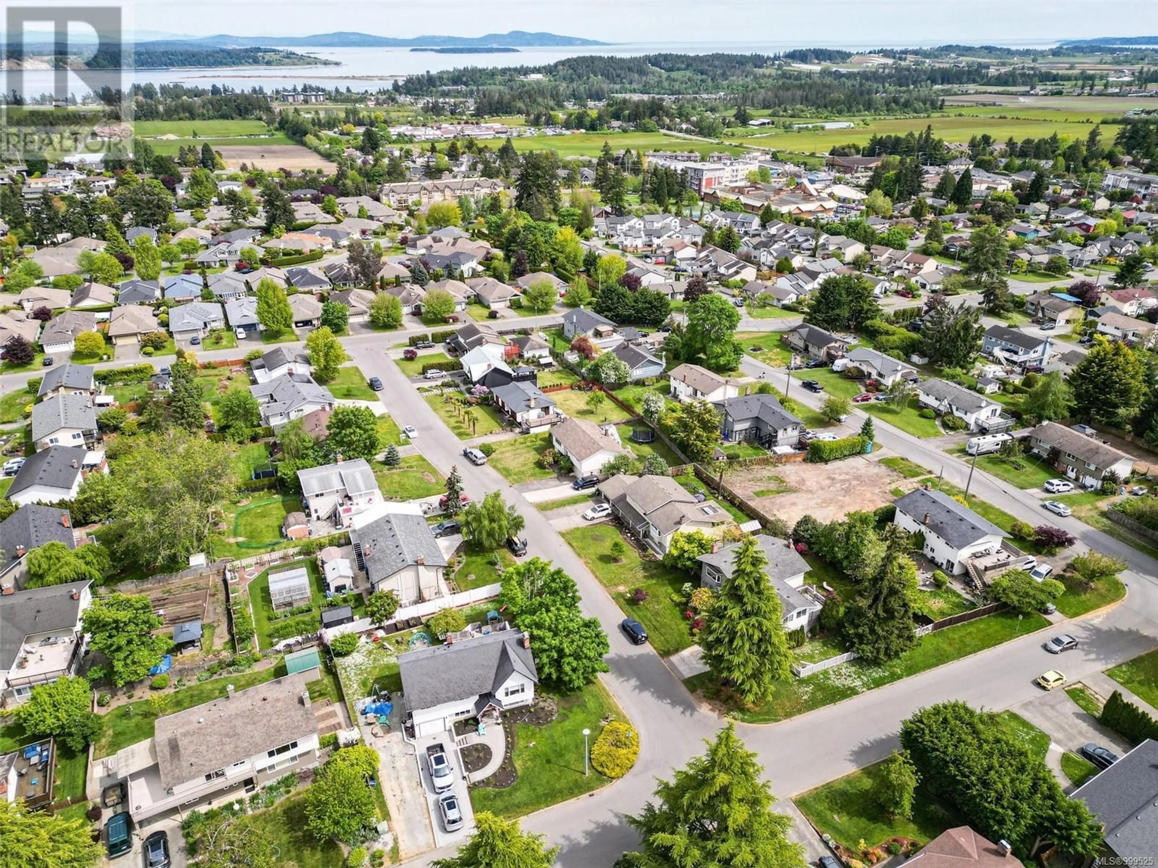 A pic from outside/outdoor area/front of a property/back of a property/a pic from drone, street for 1881 SEABOARD CRESCENT, Central Saanich British Columbia V8M1K6