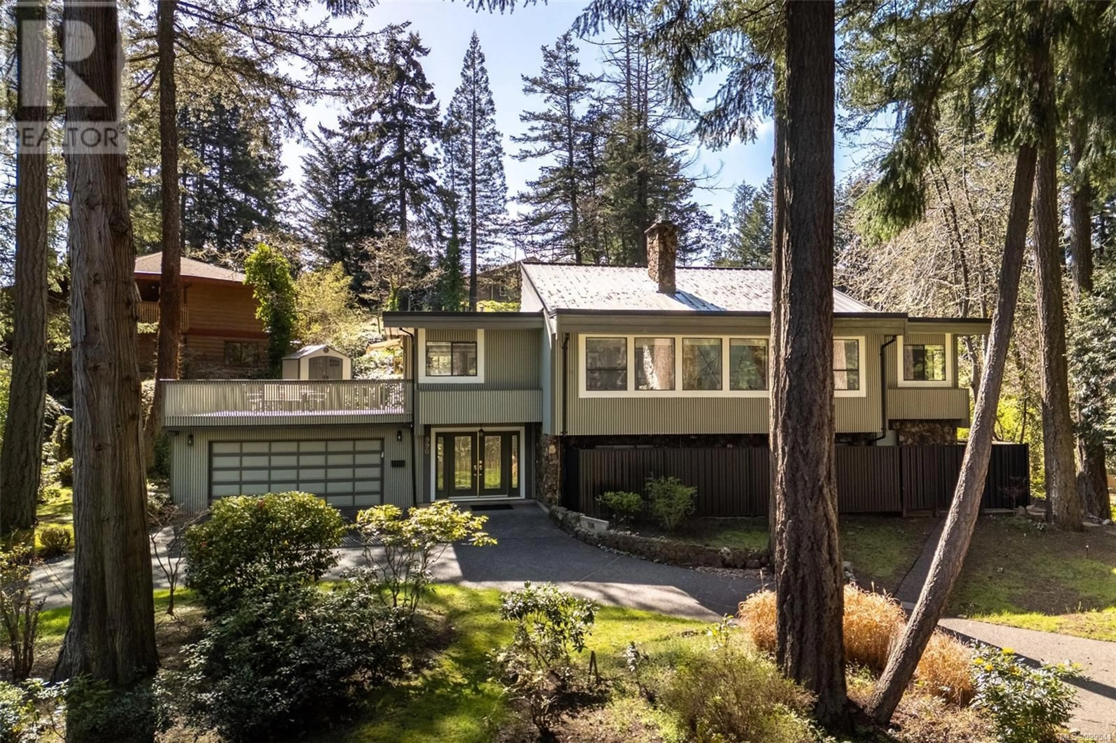A pic from outside/outdoor area/front of a property/back of a property/a pic from drone, forest/trees view for 990 COTTONTREE CLOSE, Saanich British Columbia V8X4E9