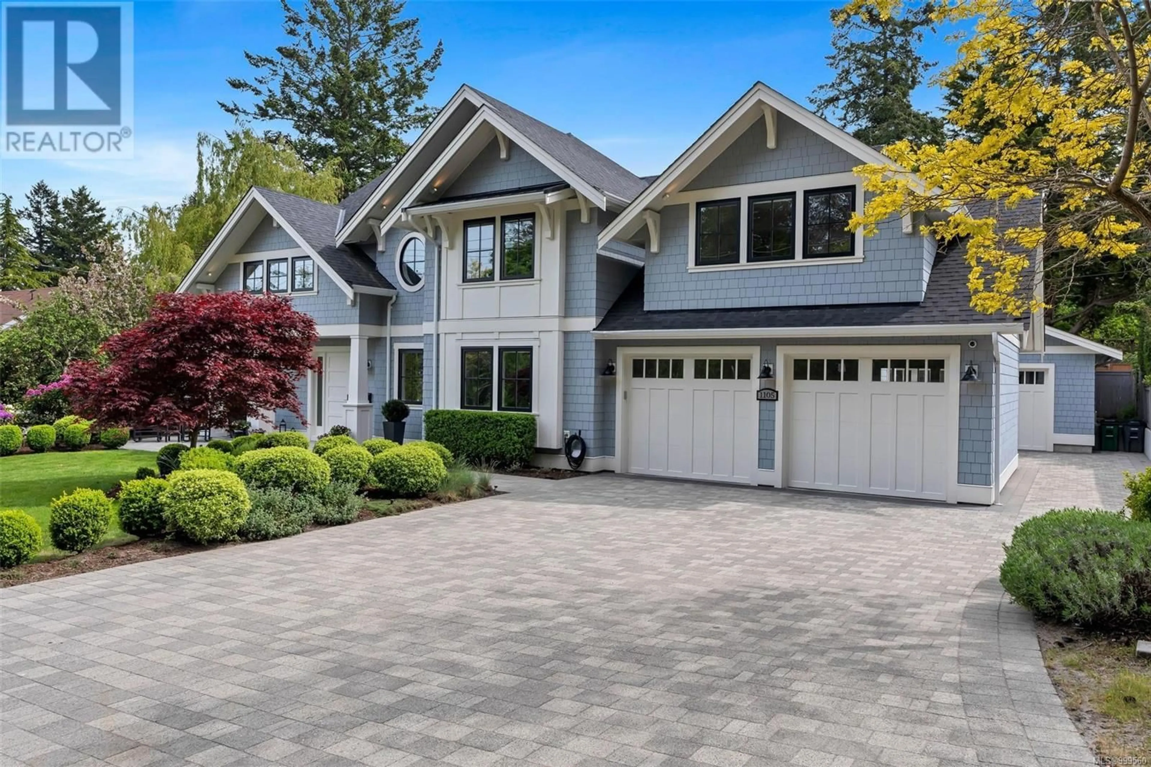 Home with vinyl exterior material, street for 1105 DARCY LANE, Saanich British Columbia V8Y1G1