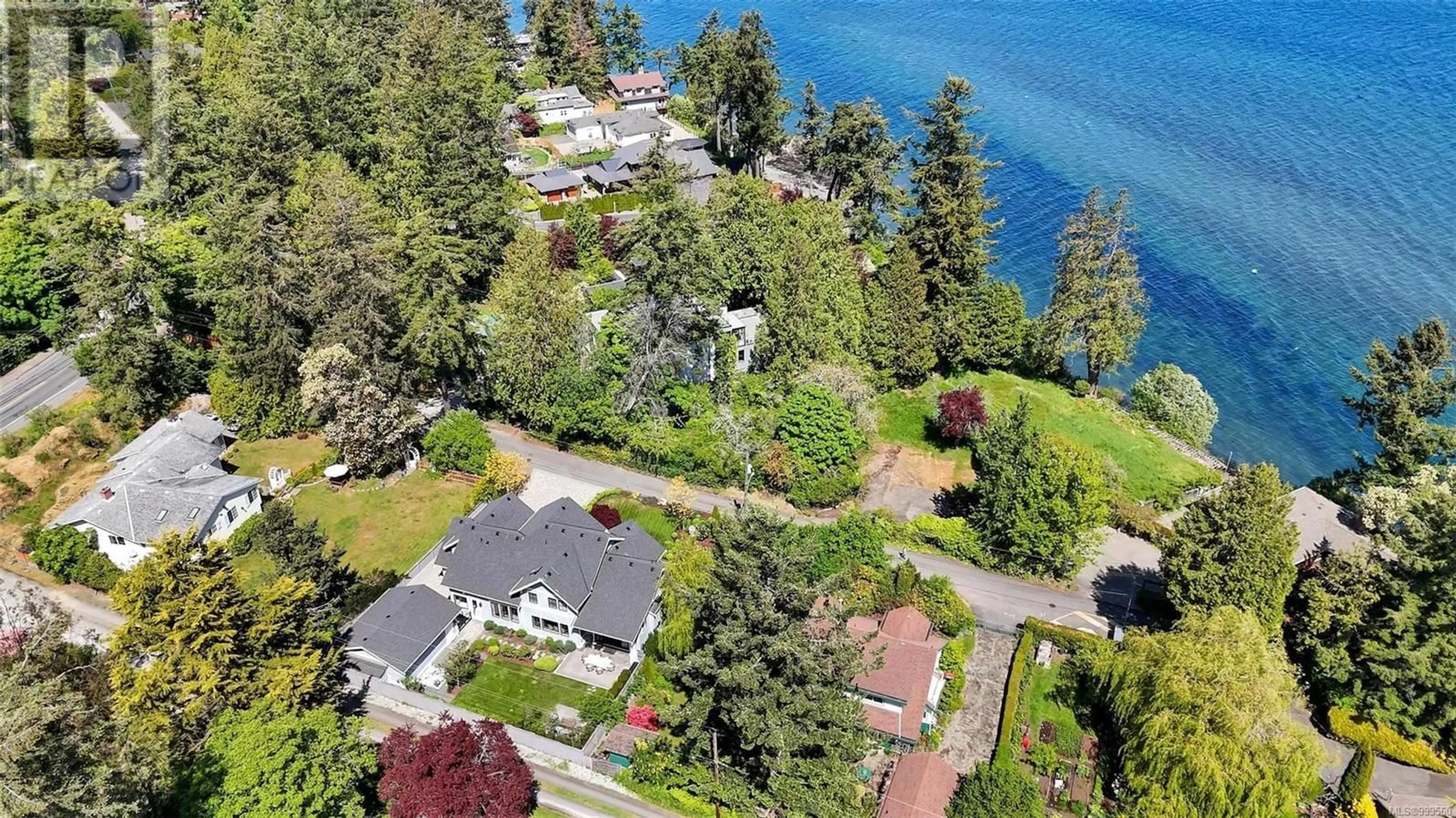 A pic from outside/outdoor area/front of a property/back of a property/a pic from drone, water/lake/river/ocean view for 1105 DARCY LANE, Saanich British Columbia V8Y1G1