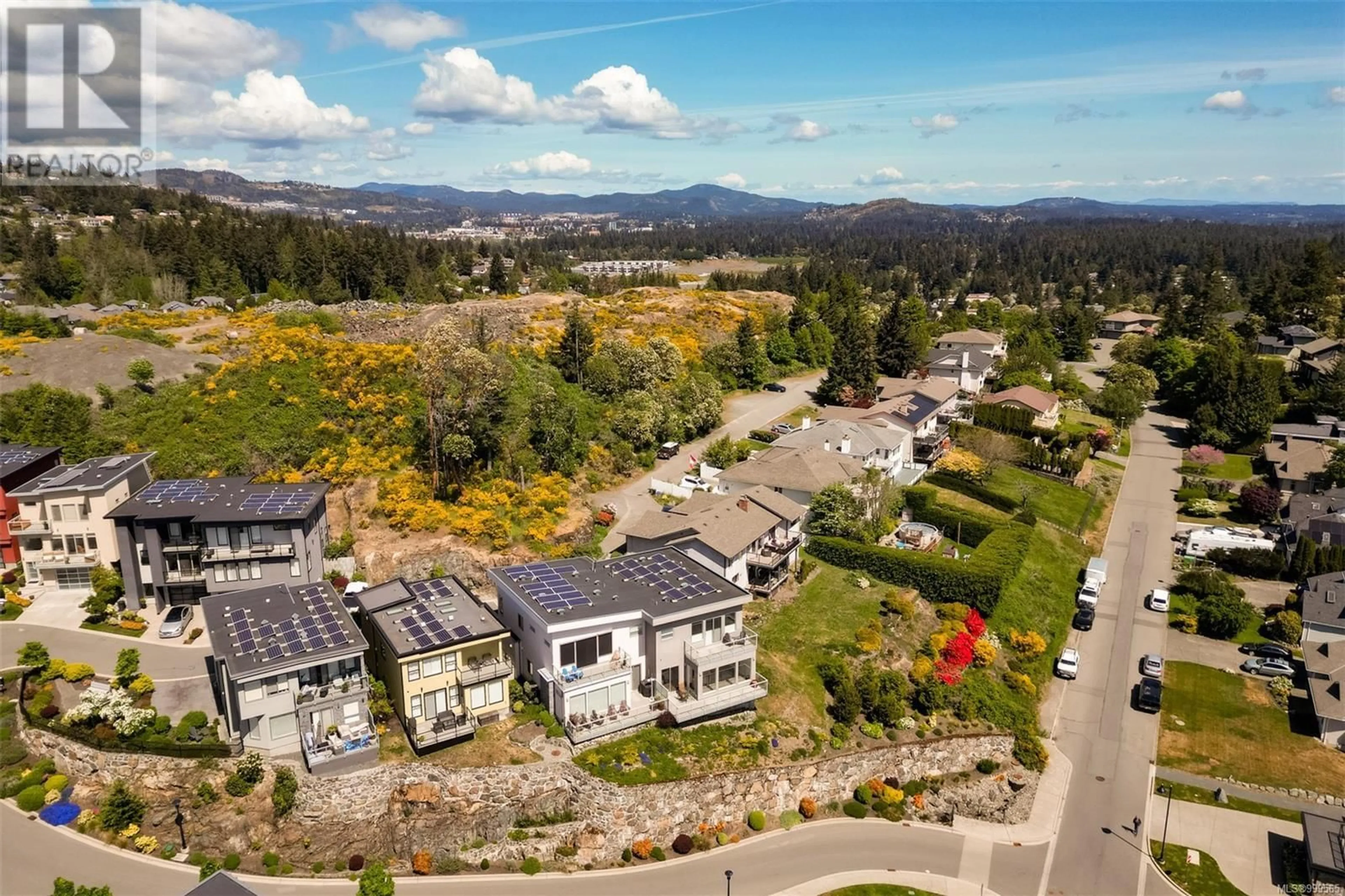 A pic from outside/outdoor area/front of a property/back of a property/a pic from drone, mountain view for 101 - 539 DELORA DRIVE, Colwood British Columbia V9C0M2