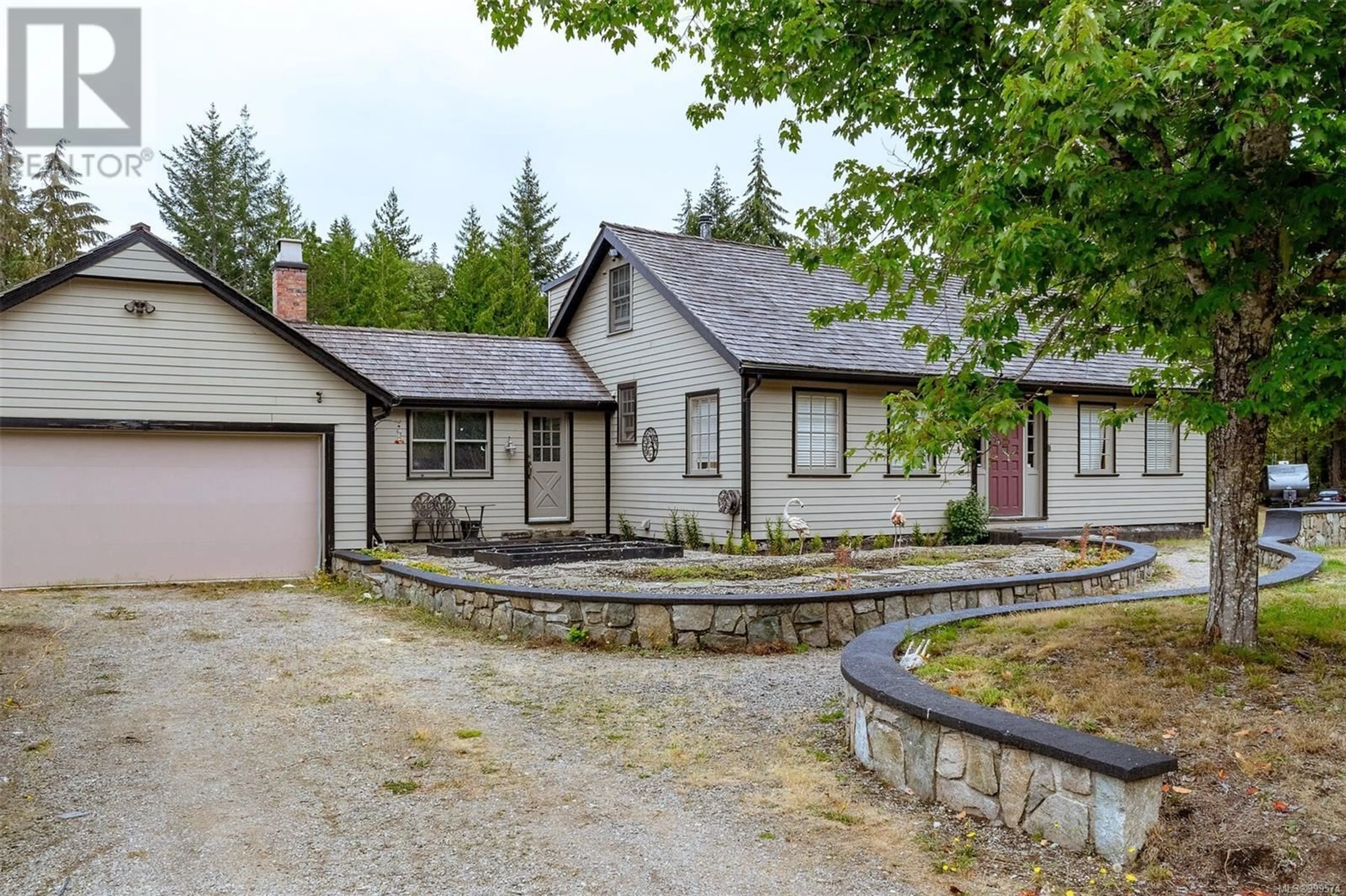 A pic from outside/outdoor area/front of a property/back of a property/a pic from drone, street for 285 POLEGATE ROAD, Qualicum Beach British Columbia V9K1Y9