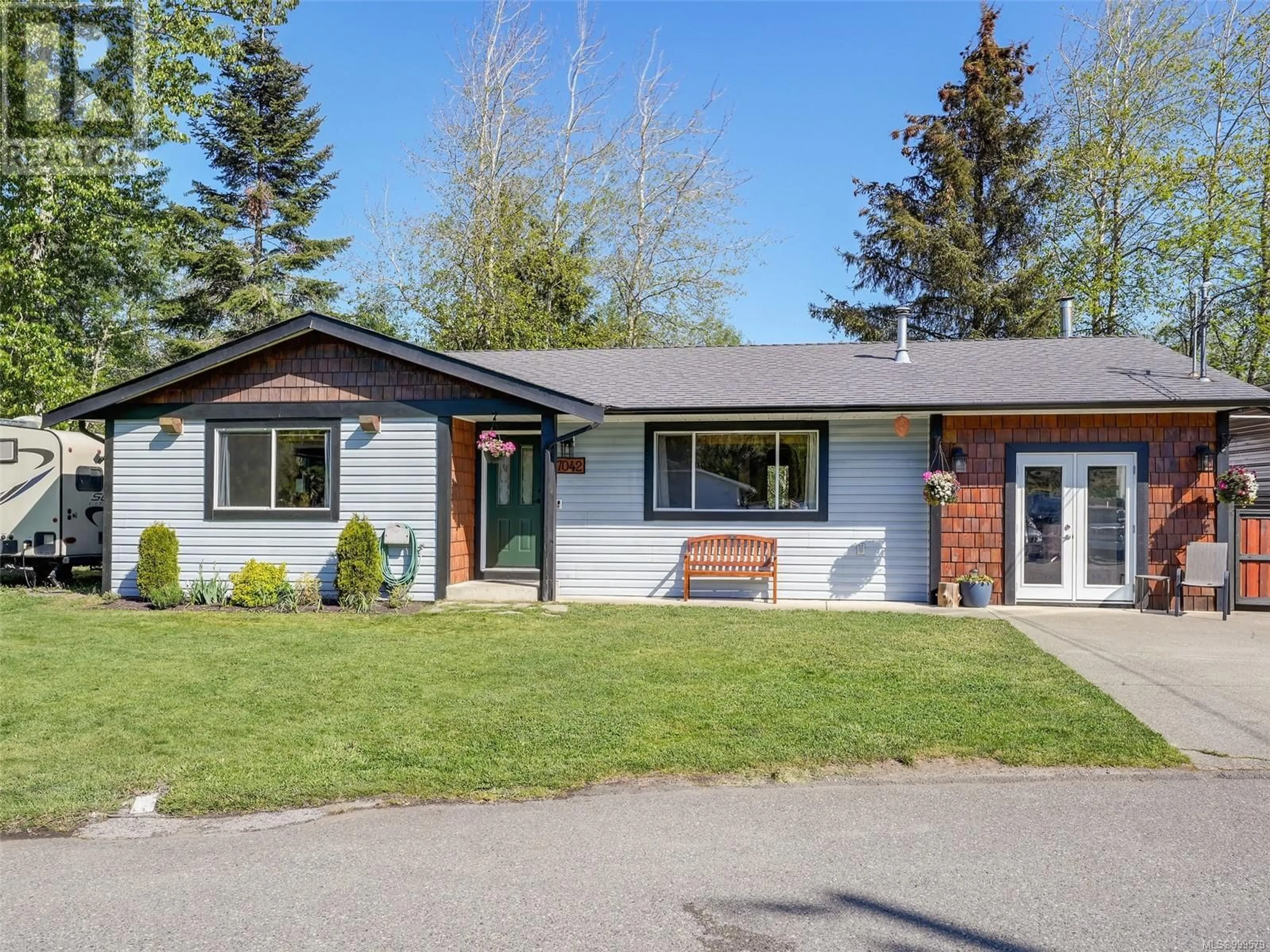 Home with vinyl exterior material, street for 7042 BROOKS PLACE, Sooke British Columbia V9Z0P9