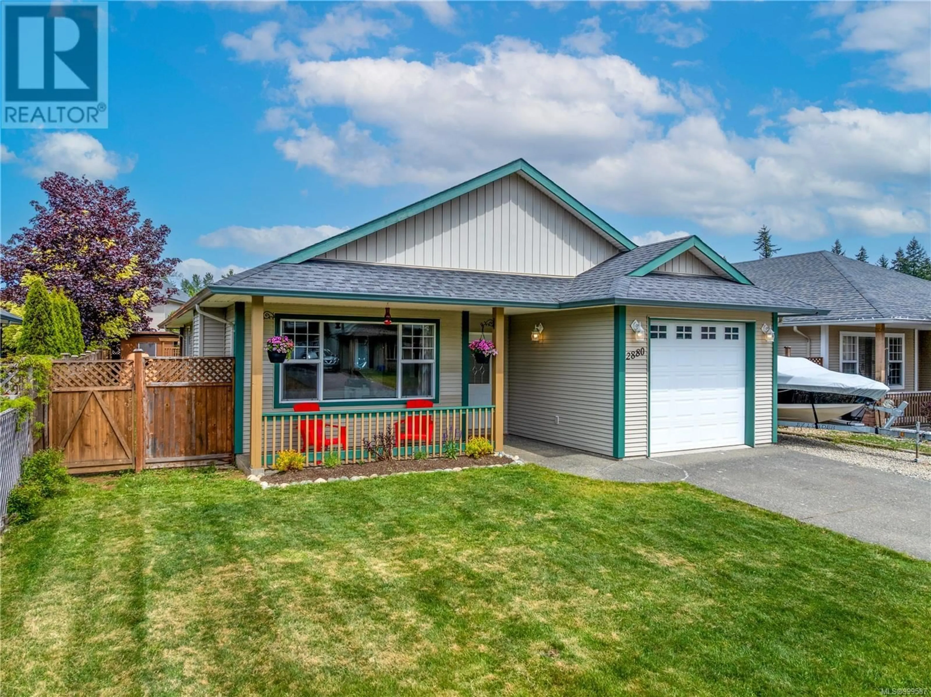 Home with vinyl exterior material, street for 2880 BRUCE STREET, Cumberland British Columbia V0R1S0
