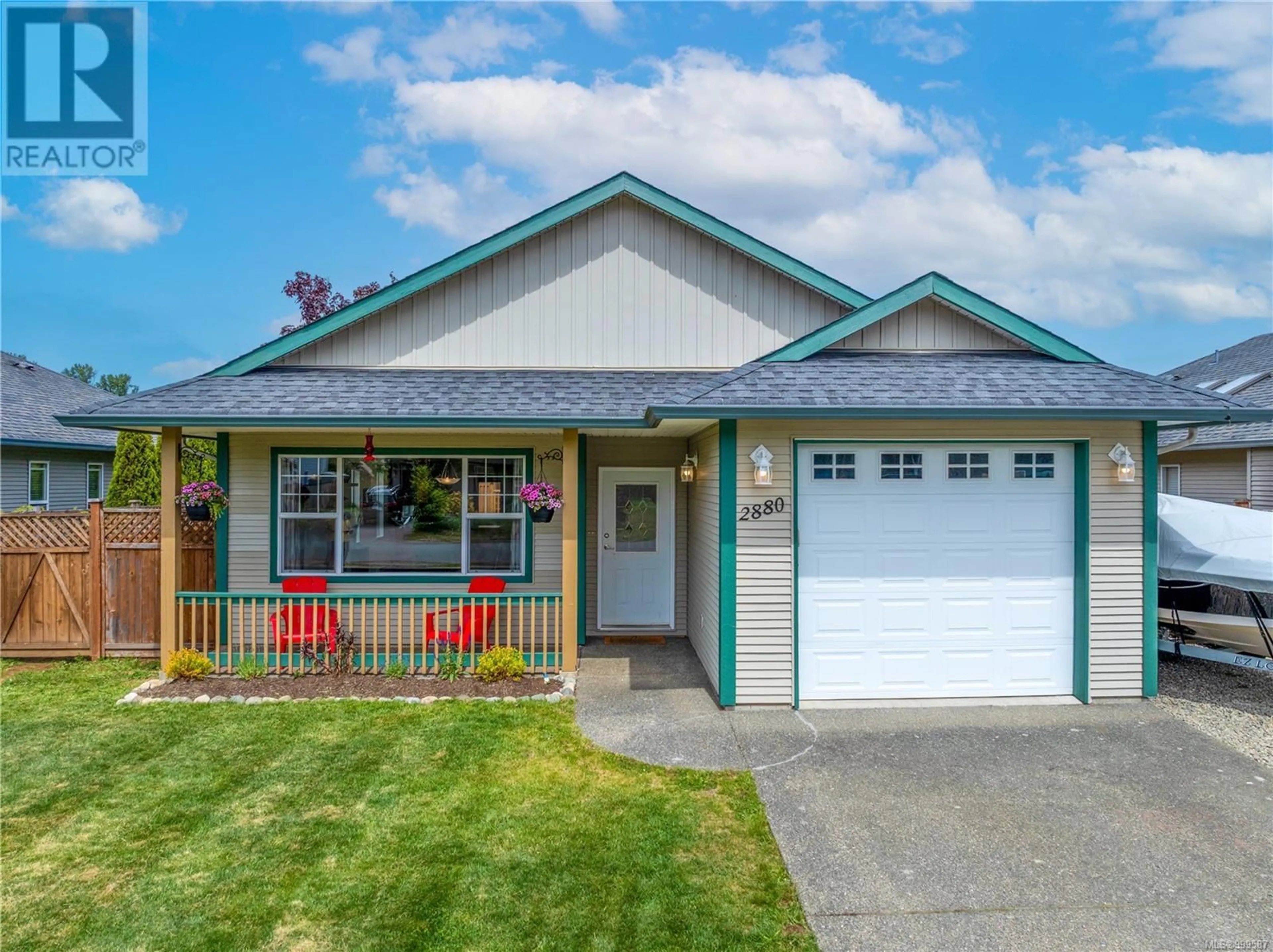 Home with vinyl exterior material, street for 2880 BRUCE STREET, Cumberland British Columbia V0R1S0