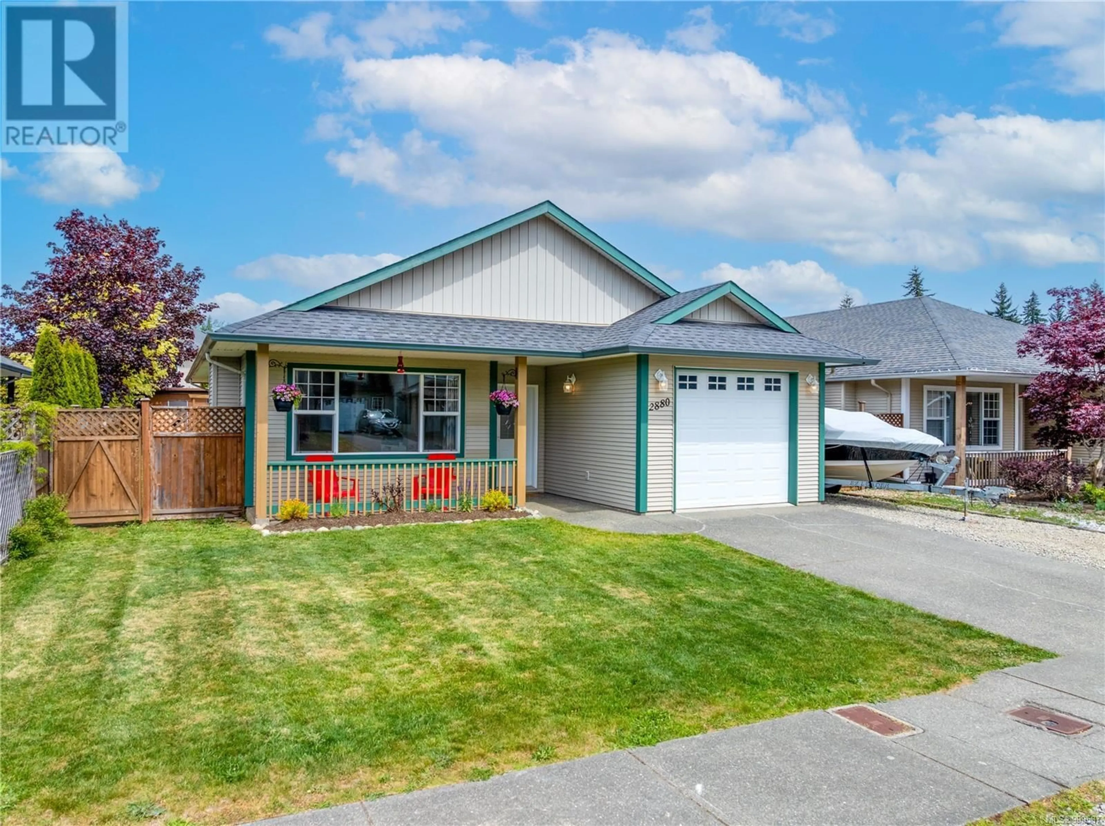 Home with vinyl exterior material, street for 2880 BRUCE STREET, Cumberland British Columbia V0R1S0