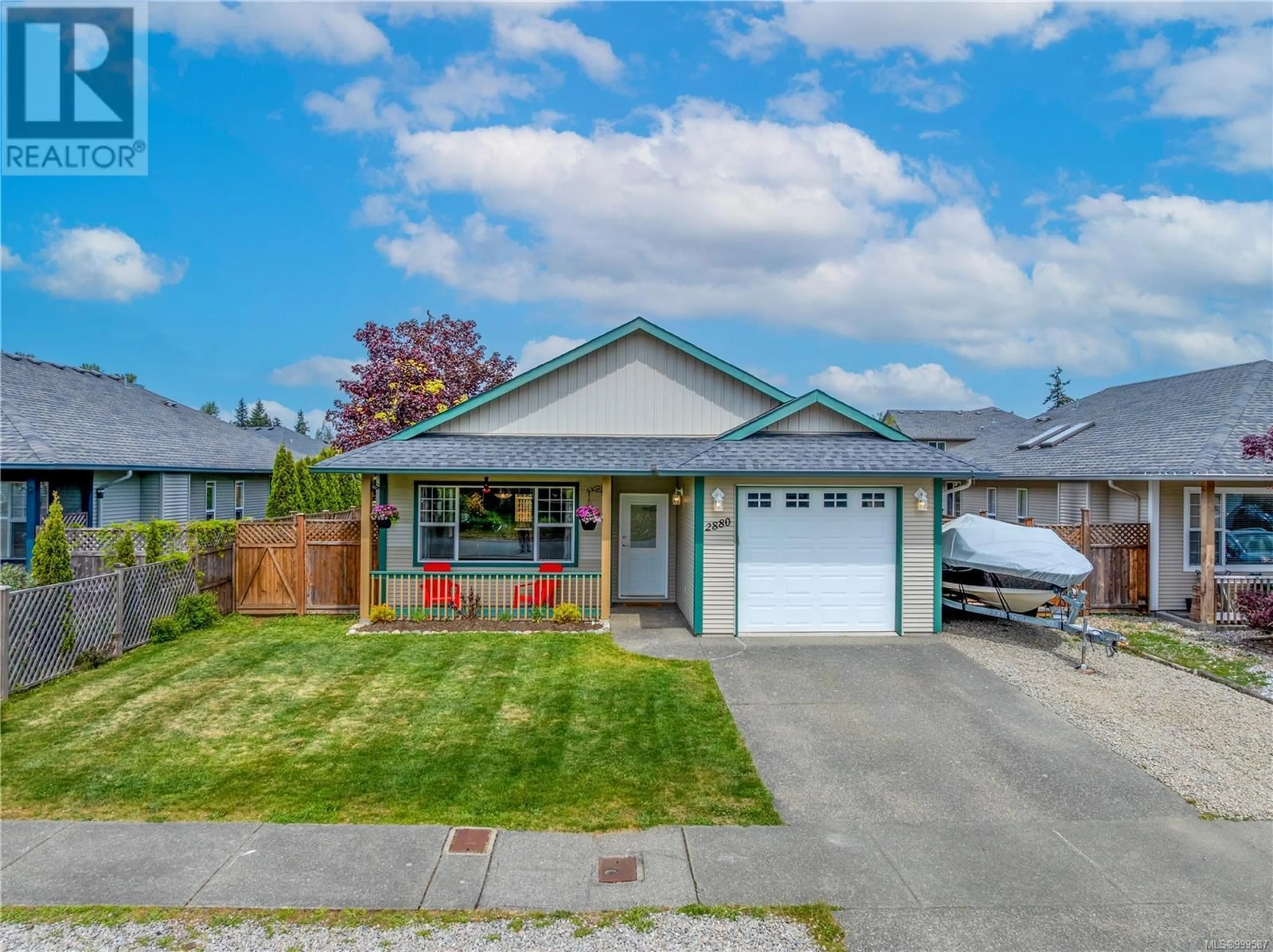 Home with vinyl exterior material, street for 2880 BRUCE STREET, Cumberland British Columbia V0R1S0