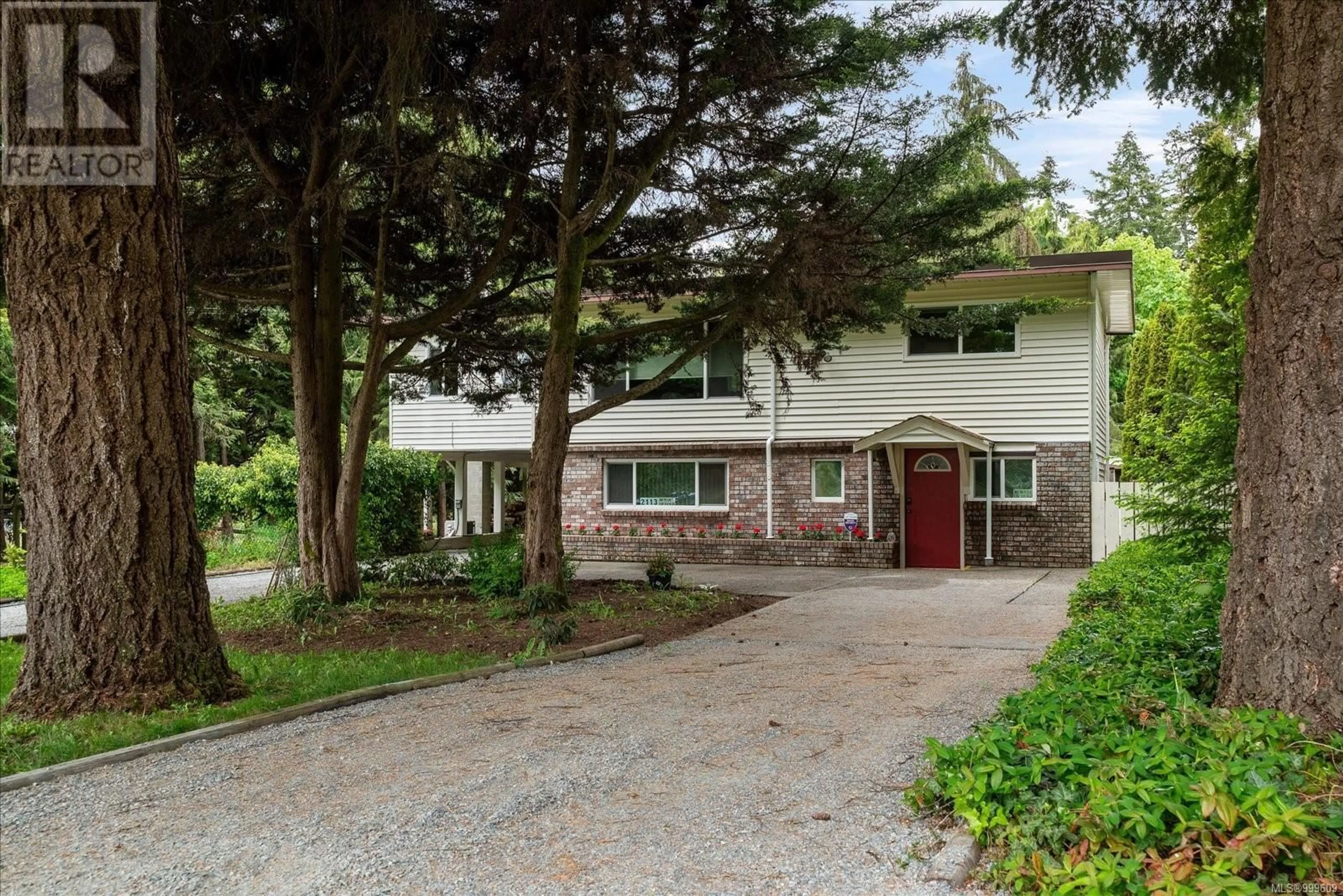 Home with brick exterior material, street for 2113 FURN ROAD, Nanaimo British Columbia V9X1J8