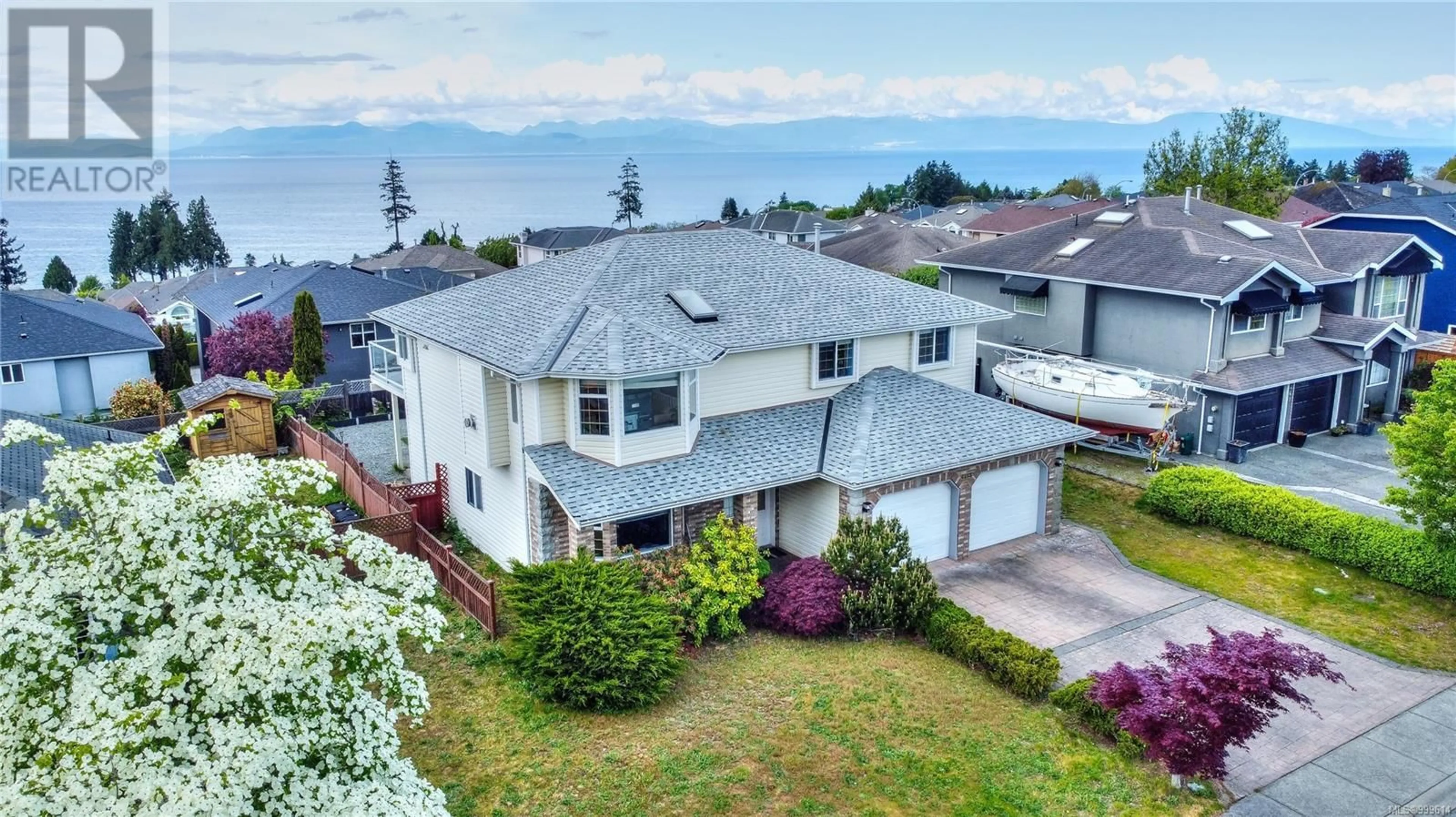 A pic from outside/outdoor area/front of a property/back of a property/a pic from drone, unknown for 6465 LASALLE ROAD, Nanaimo British Columbia V9V1P3
