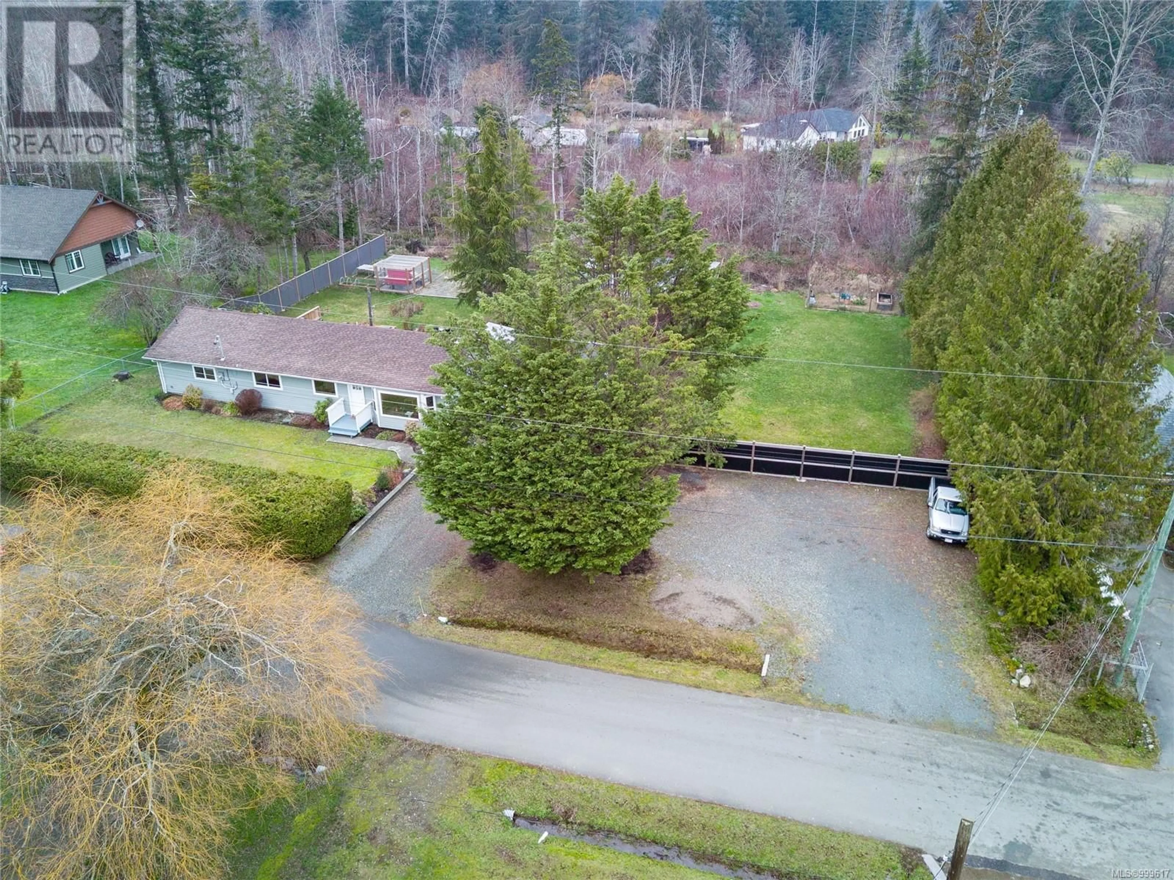 A pic from outside/outdoor area/front of a property/back of a property/a pic from drone, unknown for 1258 DON ROAD, Comox British Columbia V9M4C4