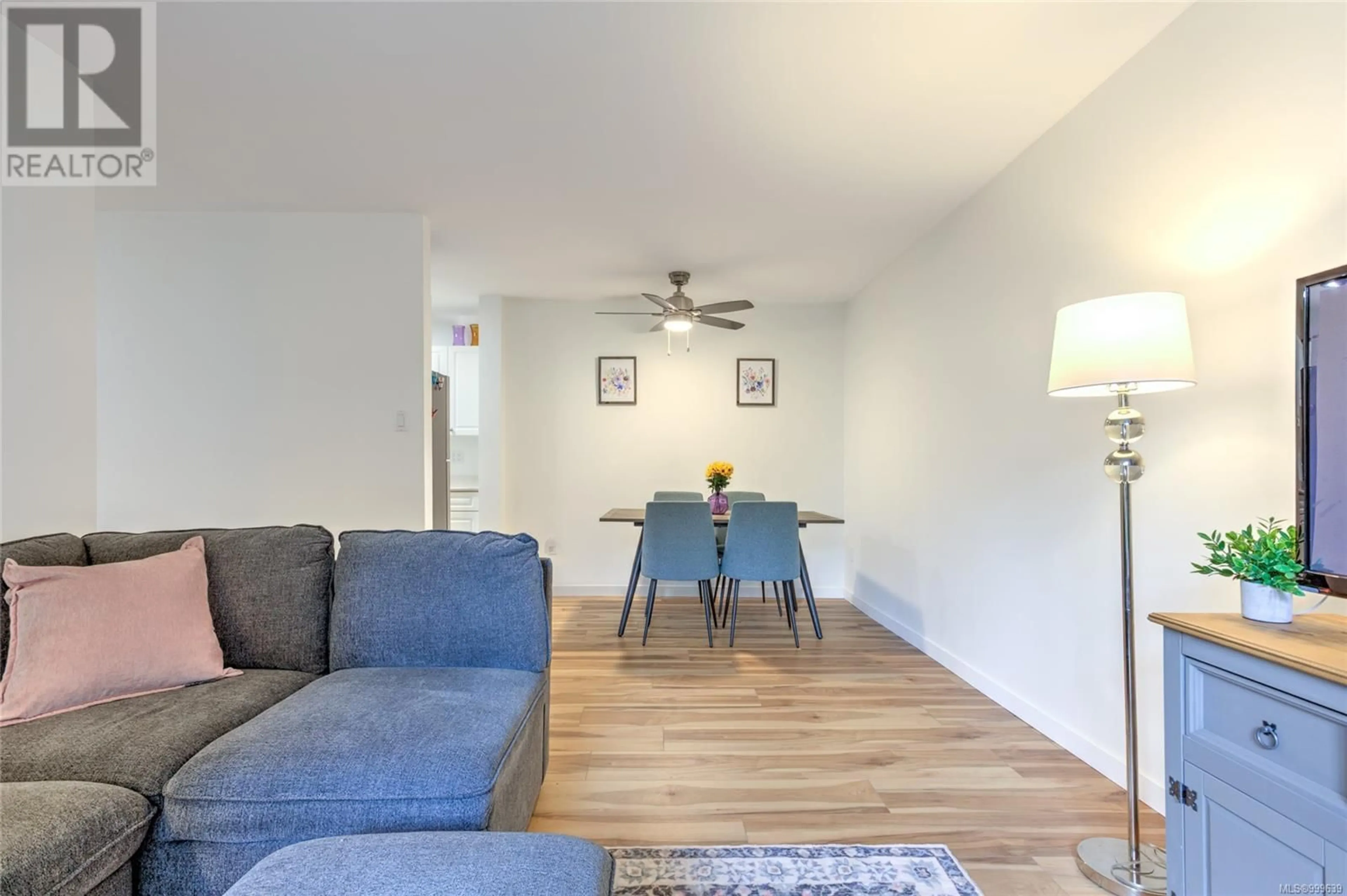 Living room with furniture, wood/laminate floor for 108 - 3251 COWICHAN LAKE ROAD, Duncan British Columbia V9L4B8