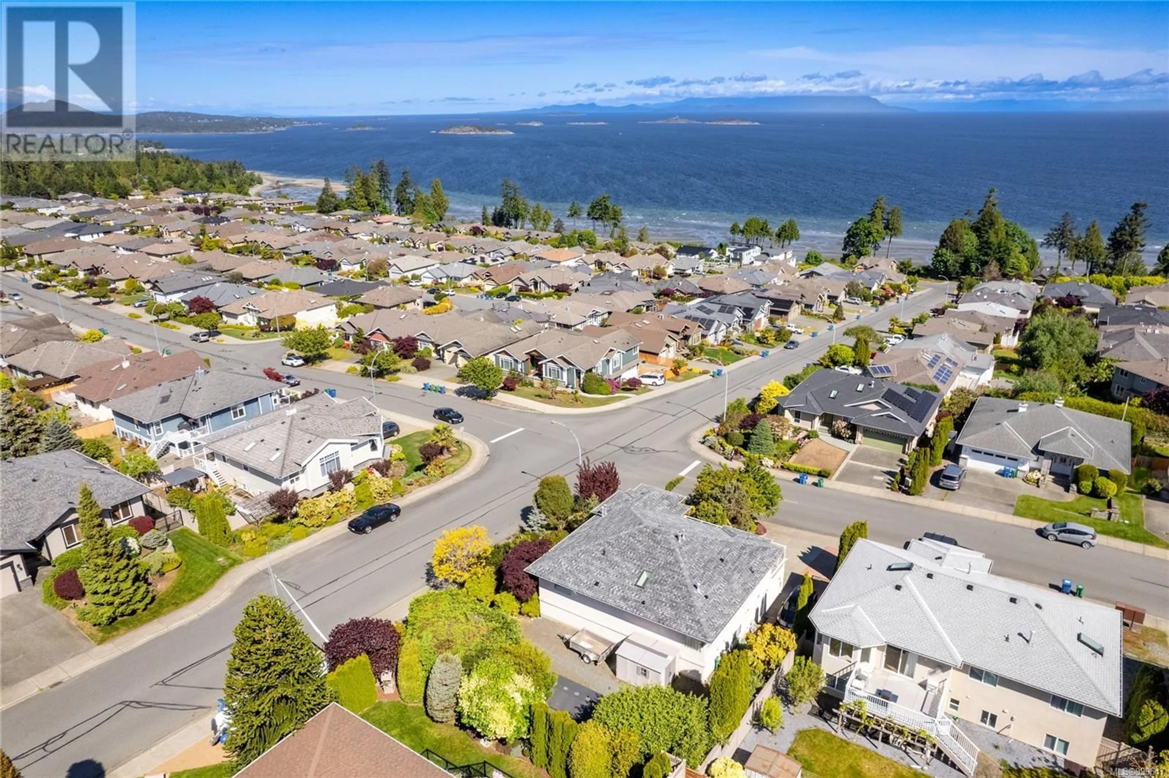 A pic from outside/outdoor area/front of a property/back of a property/a pic from drone, water/lake/river/ocean view for 6395 GROVELAND DRIVE, Nanaimo British Columbia V9V1P5