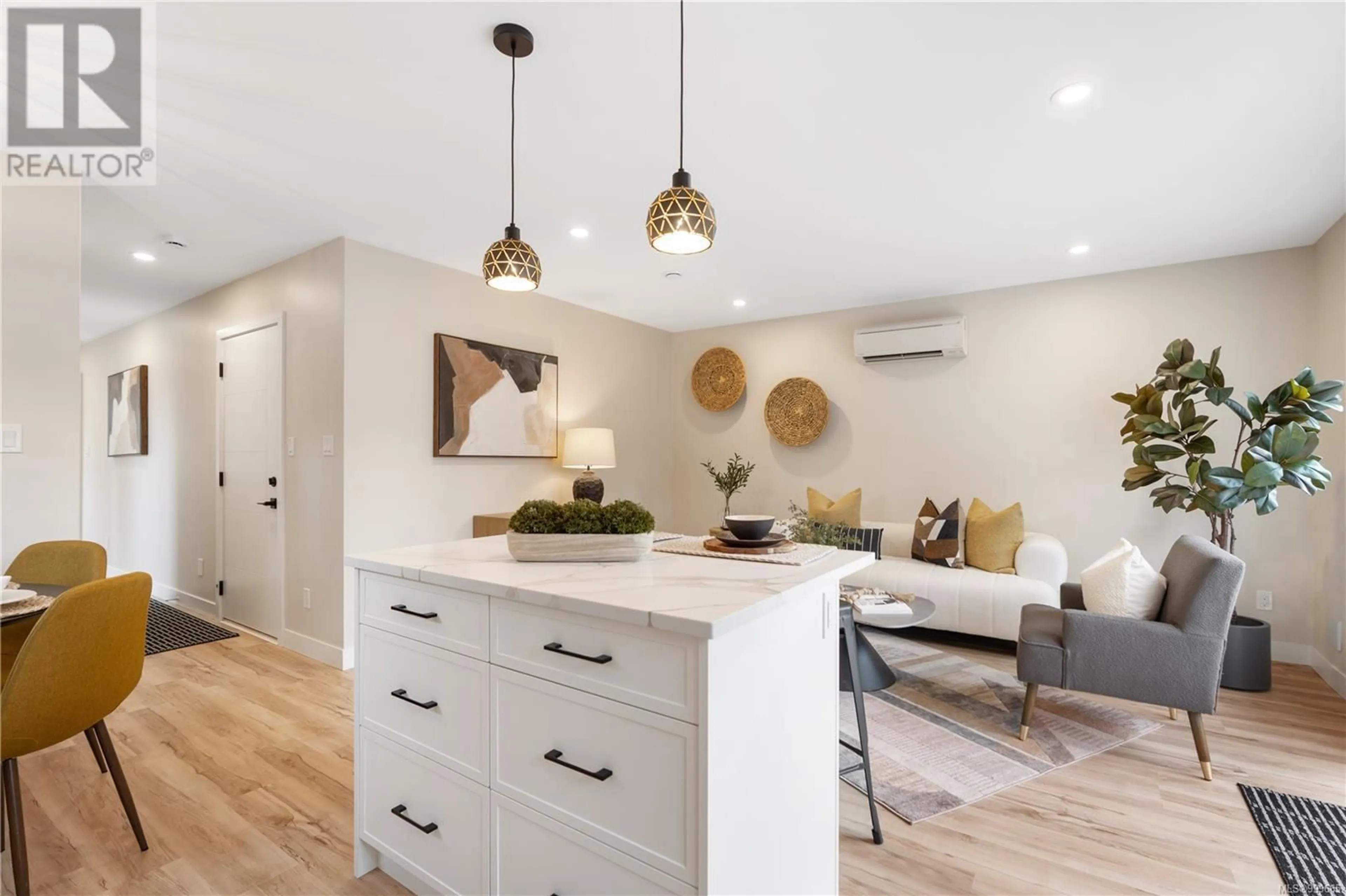 Open concept kitchen, wood/laminate floor for 724 STONEBROOK LANE, Langford British Columbia V9B5N3