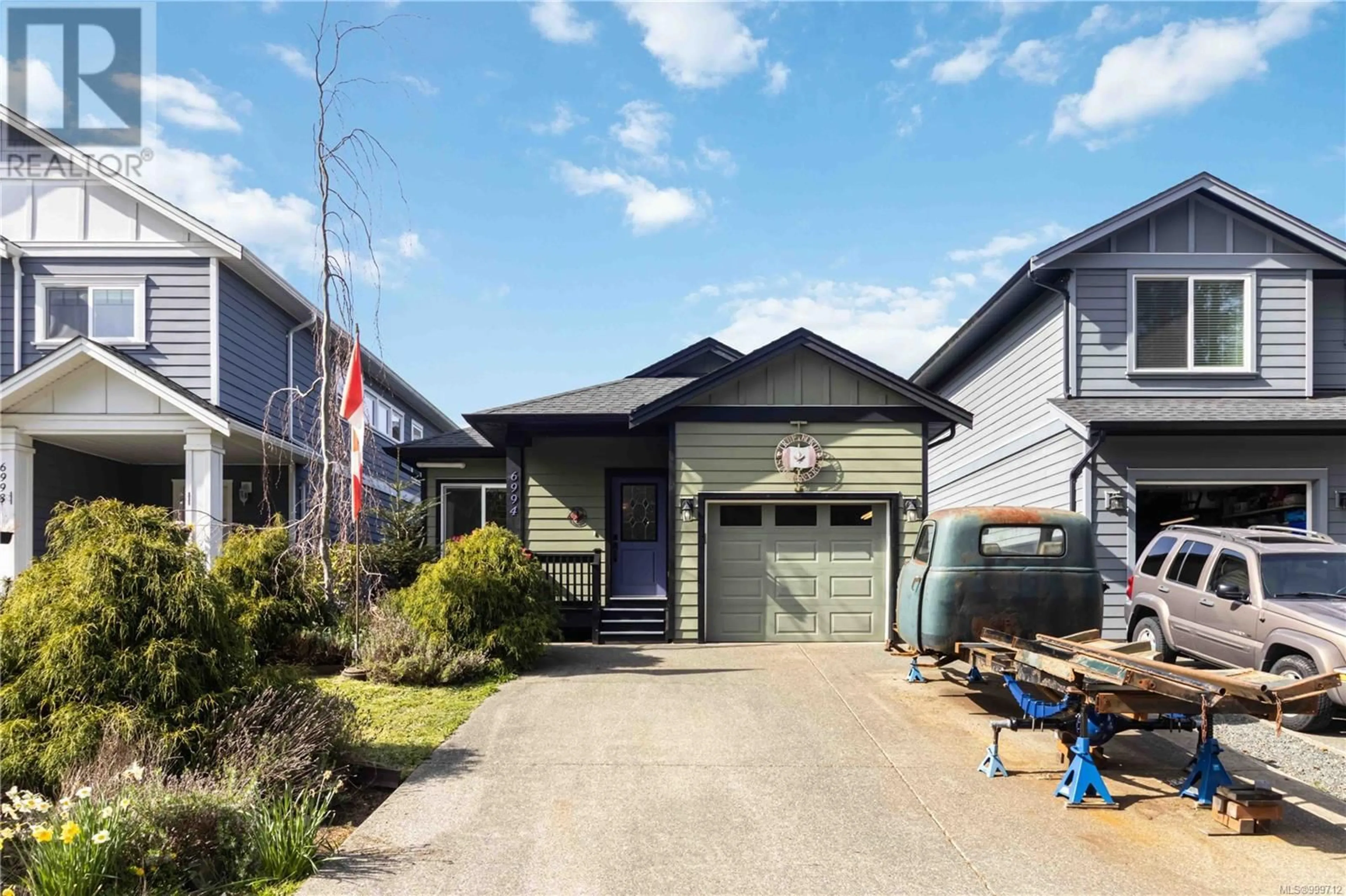 Home with vinyl exterior material, street for 6994 WRIGHT ROAD, Sooke British Columbia V9Z1M5