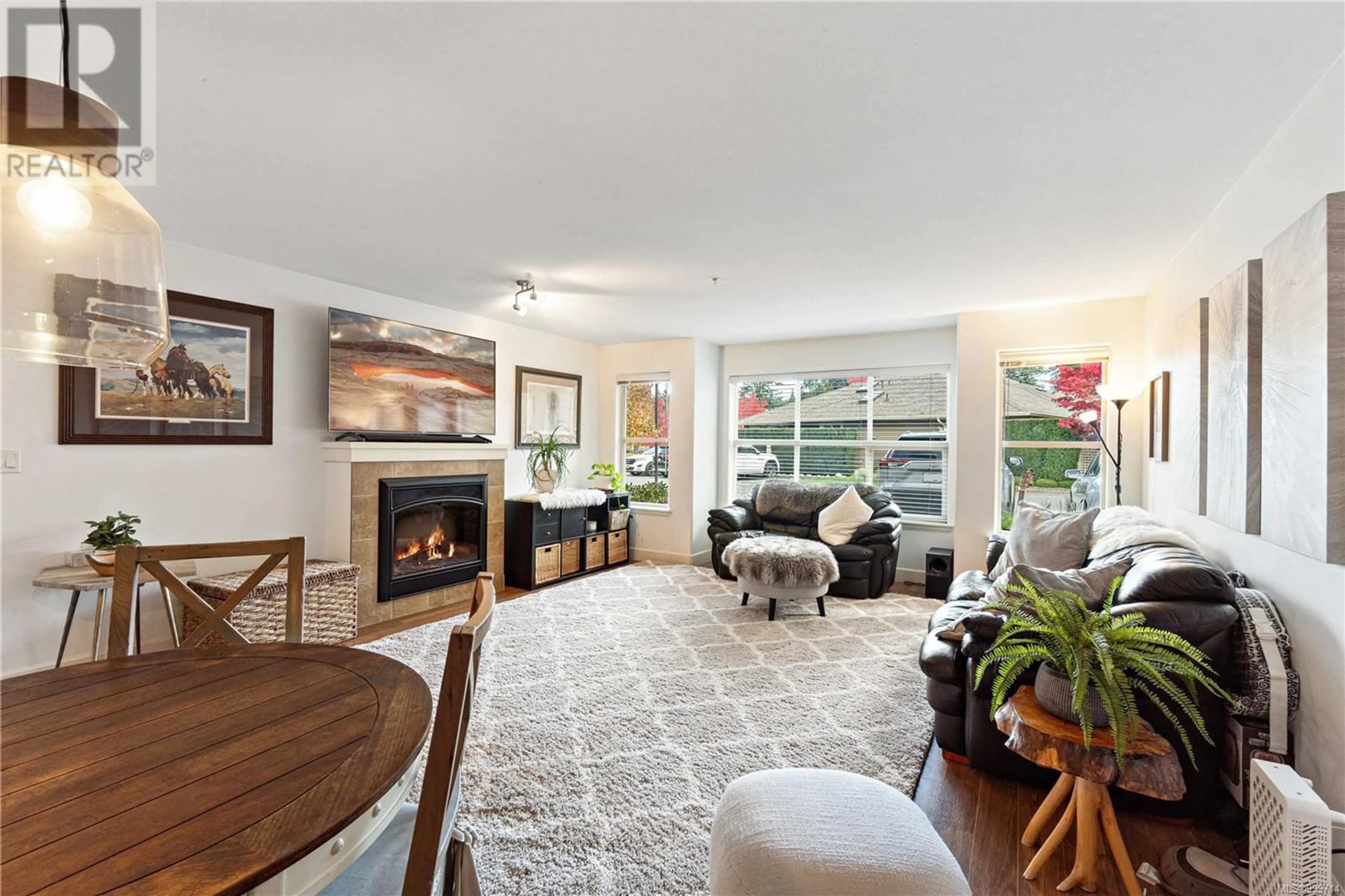 Living room with furniture, unknown for 102 - 4460 HEDGESTONE PLACE, Nanaimo British Columbia V9T0E6