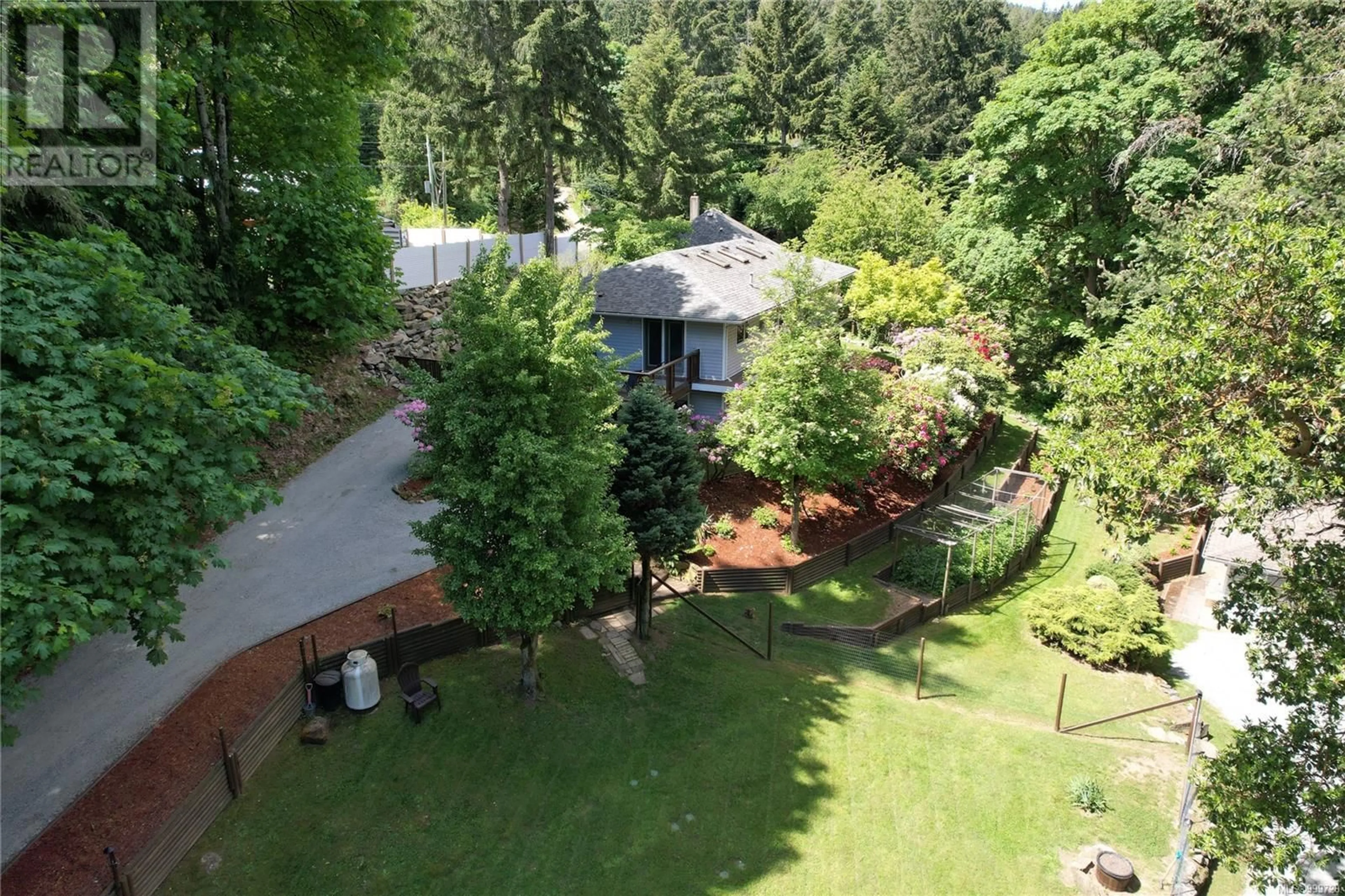 A pic from outside/outdoor area/front of a property/back of a property/a pic from drone, water/lake/river/ocean view for 141 CRANBERRY ROAD, Salt Spring British Columbia V8K2G8