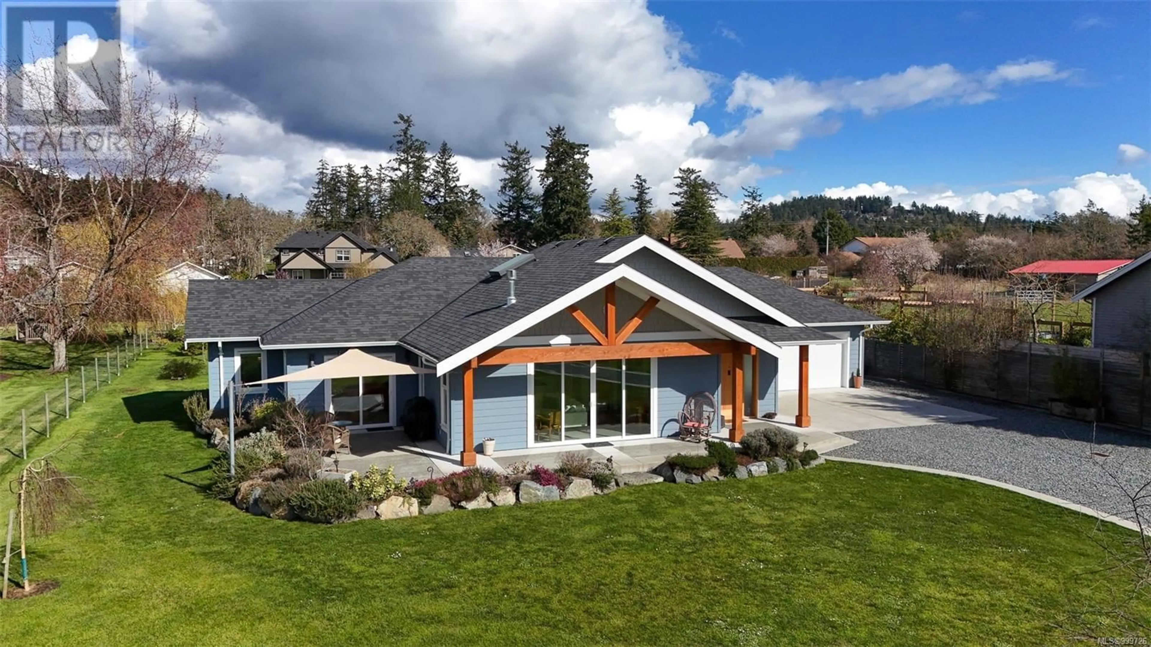 Home with vinyl exterior material, mountain view for 822 WAIN ROAD, North Saanich British Columbia V8L5N8