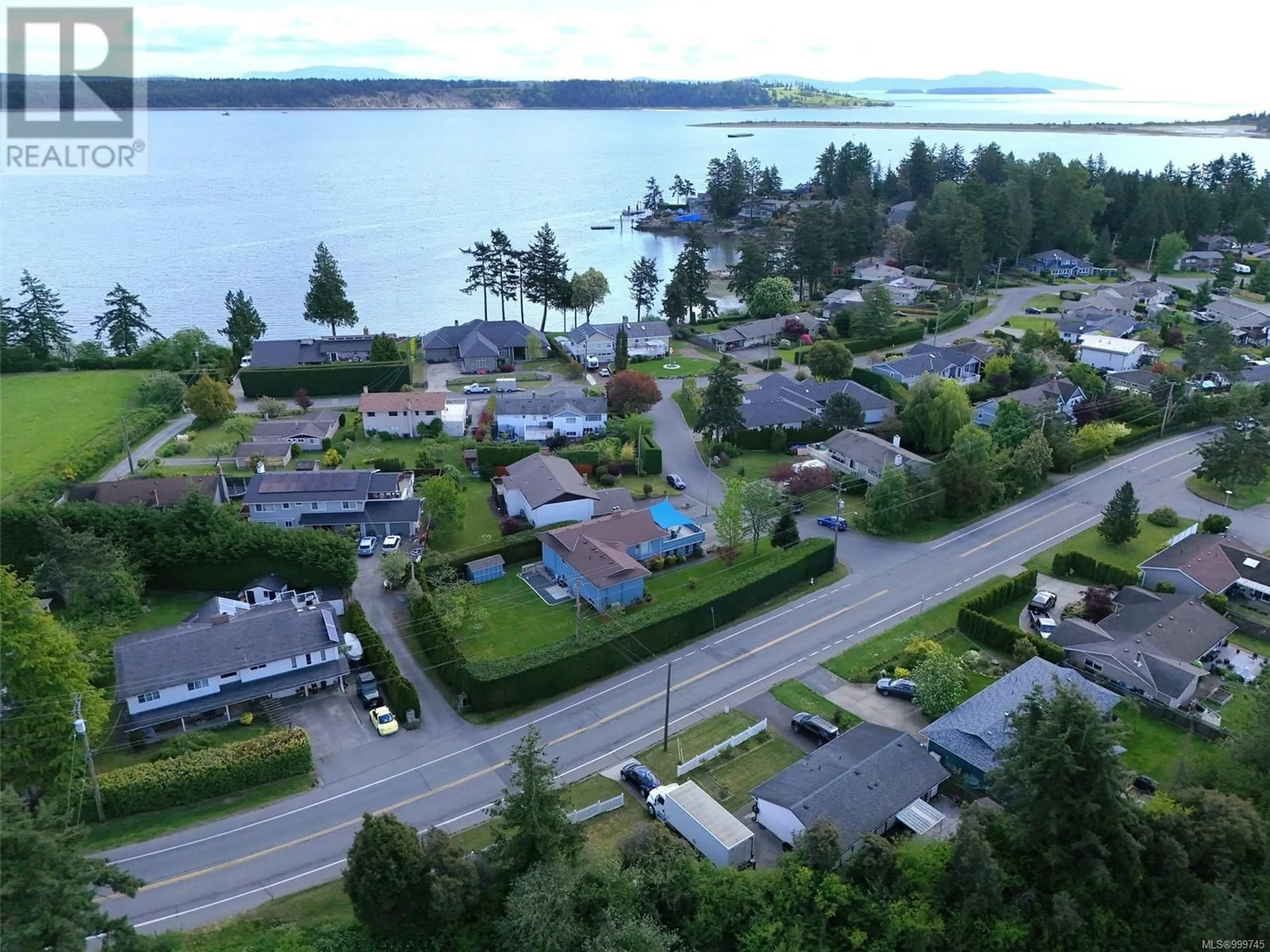 A pic from outside/outdoor area/front of a property/back of a property/a pic from drone, water/lake/river/ocean view for 8046 LOCHSIDE, Central Saanich British Columbia V8M1V5