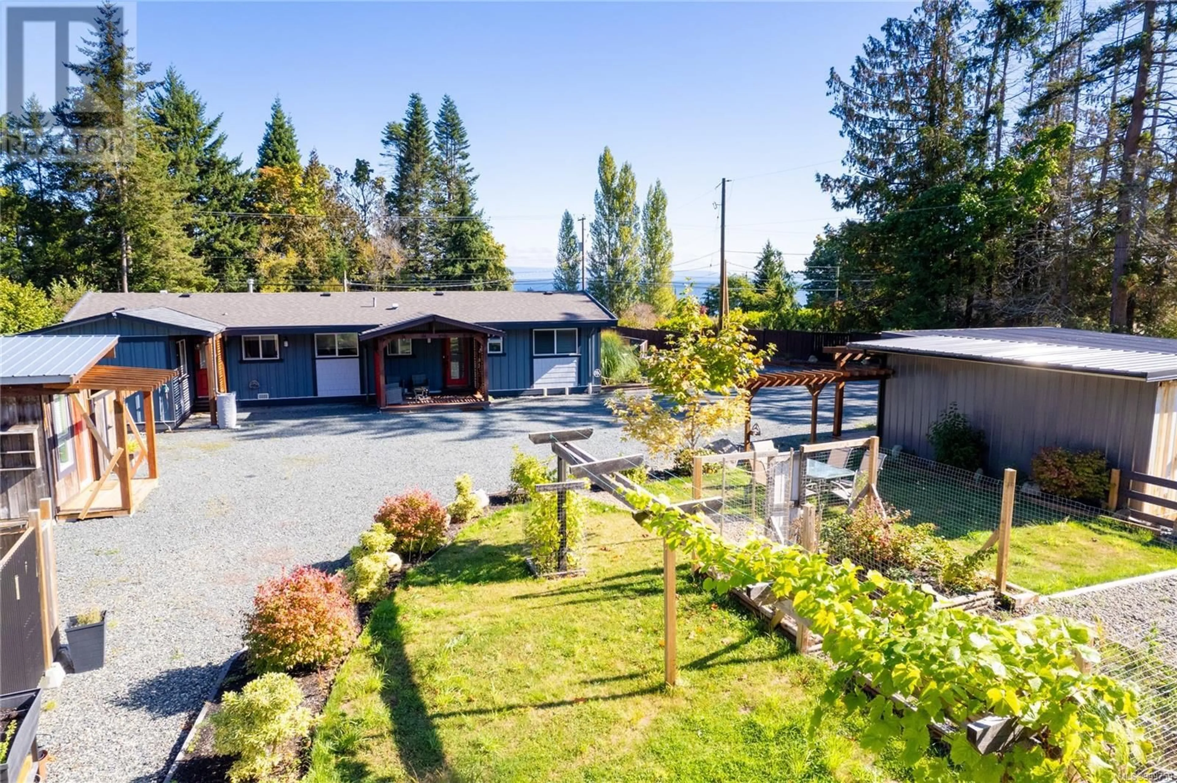A pic from outside/outdoor area/front of a property/back of a property/a pic from drone, mountain view for 6712 ISLAND HIGHWAY WEST, Bowser British Columbia V0R1G0
