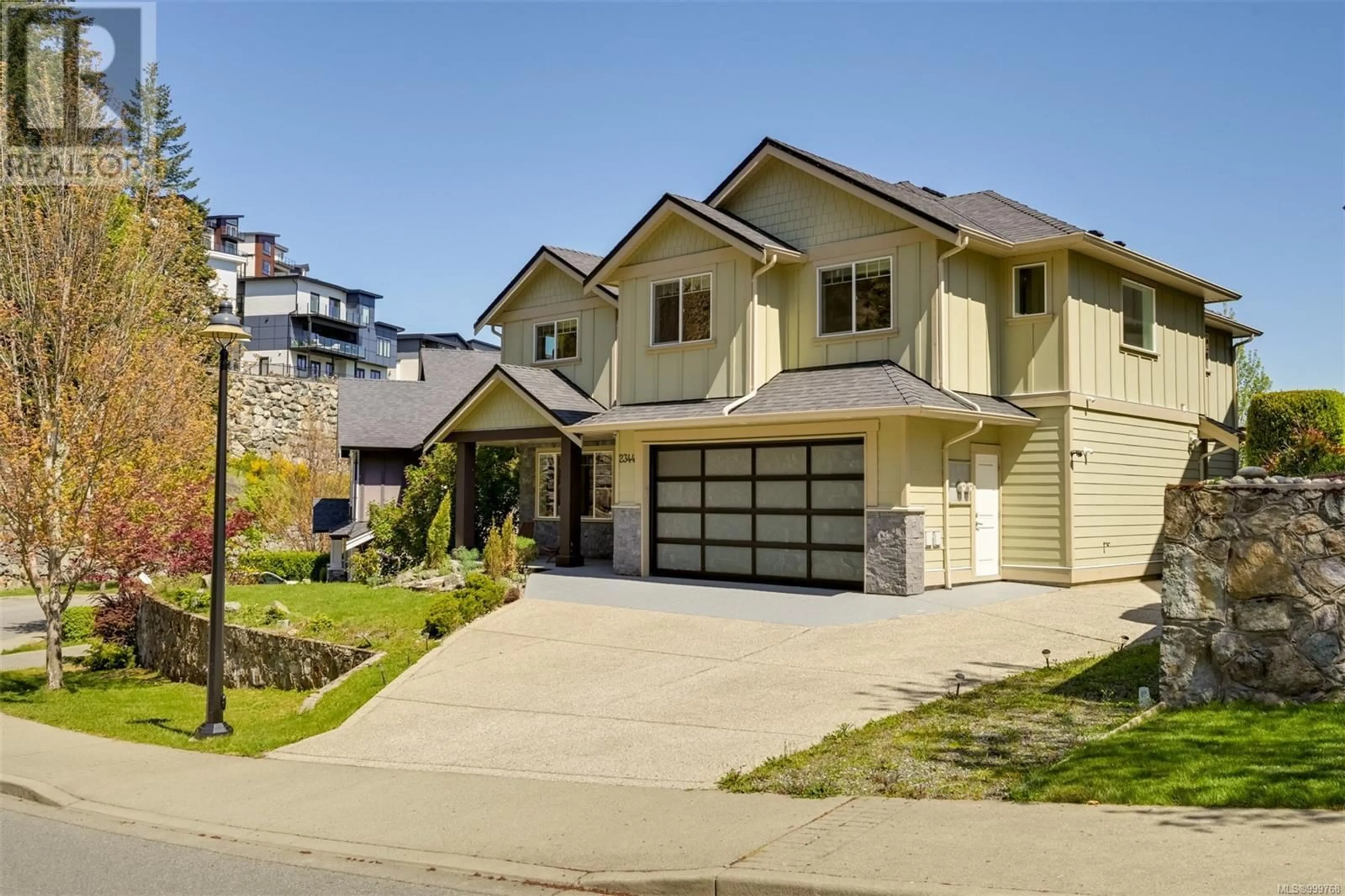 Home with vinyl exterior material, street for 2344 NICKLAUS DRIVE, Langford British Columbia V9B0L2