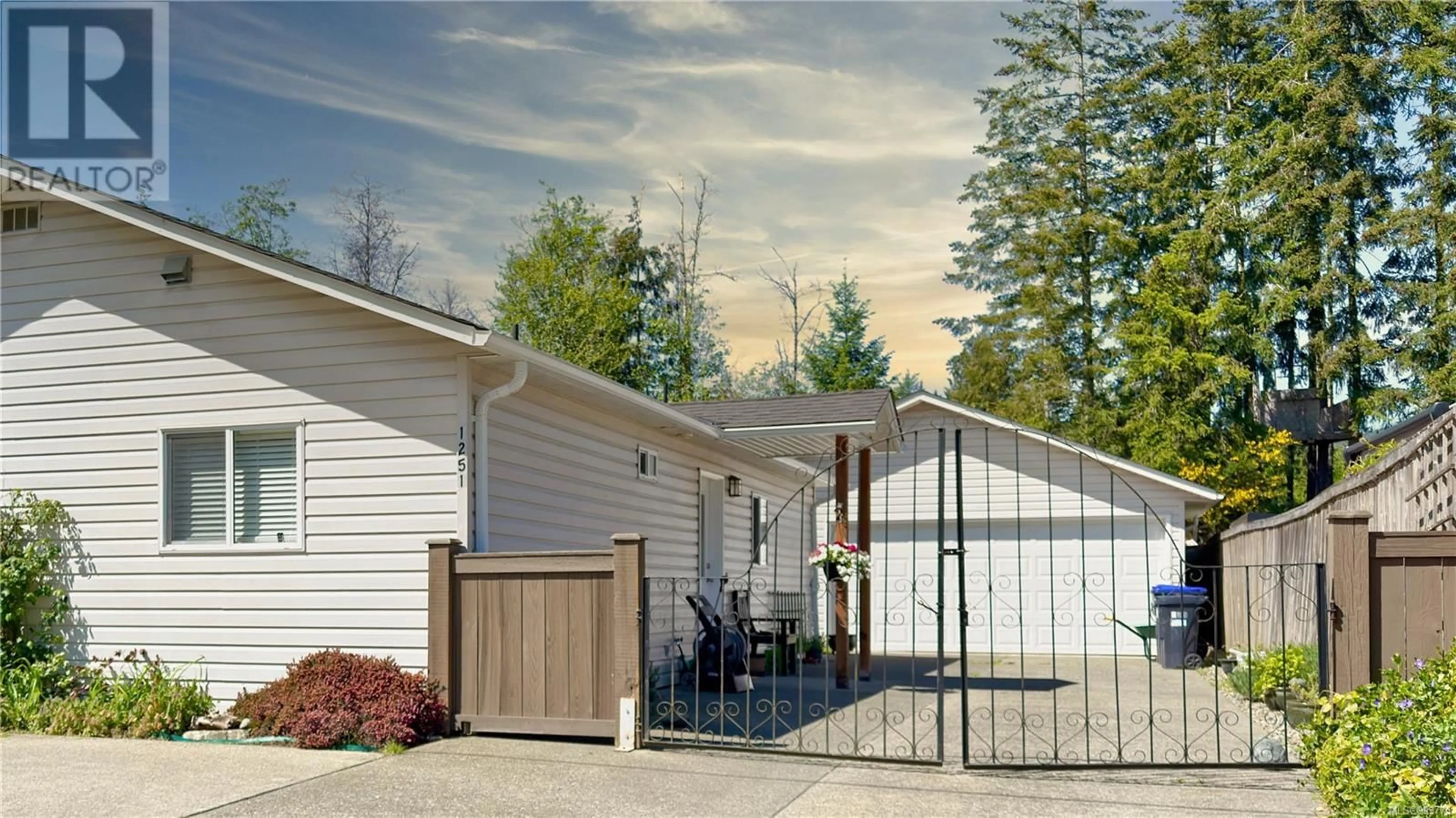 Home with vinyl exterior material, street for 1251 WESTURNE HEIGHTS ROAD, Whiskey Creek British Columbia V9K2S9