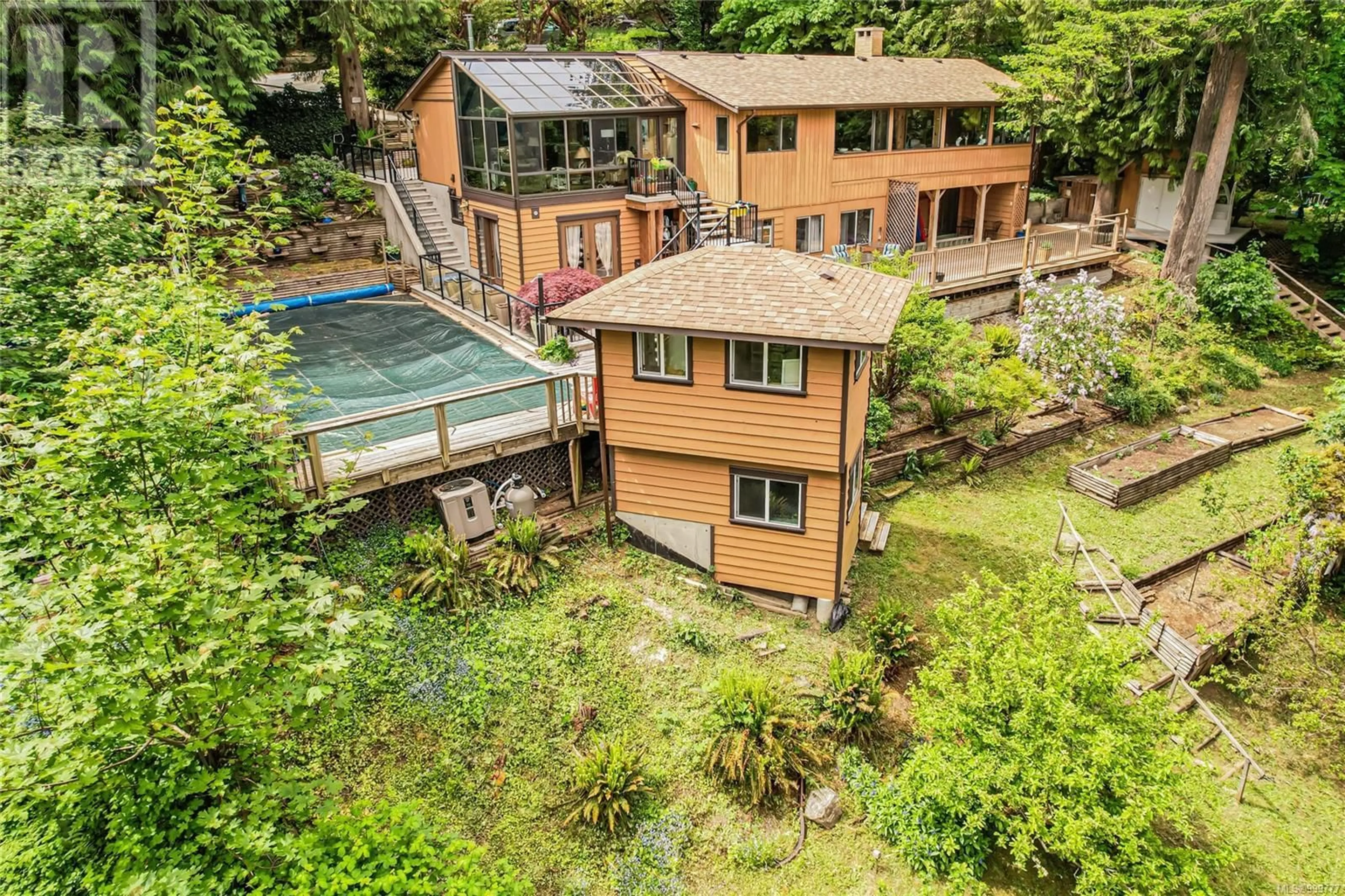A pic from outside/outdoor area/front of a property/back of a property/a pic from drone, water/lake/river/ocean view for 142 WOODLAND DRIVE, Salt Spring British Columbia V8K1K1