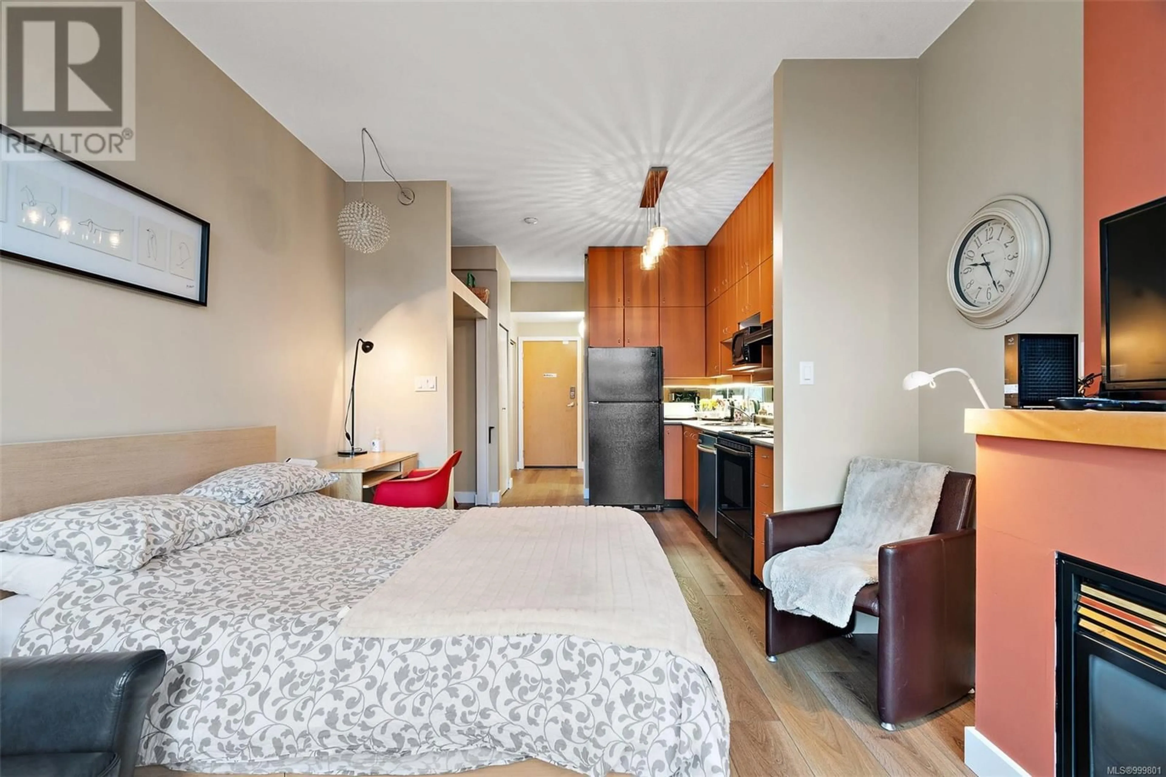 Bedroom with bed, wood/laminate floor for 219 - 409 SWIFT STREET, Victoria British Columbia V8W1S2