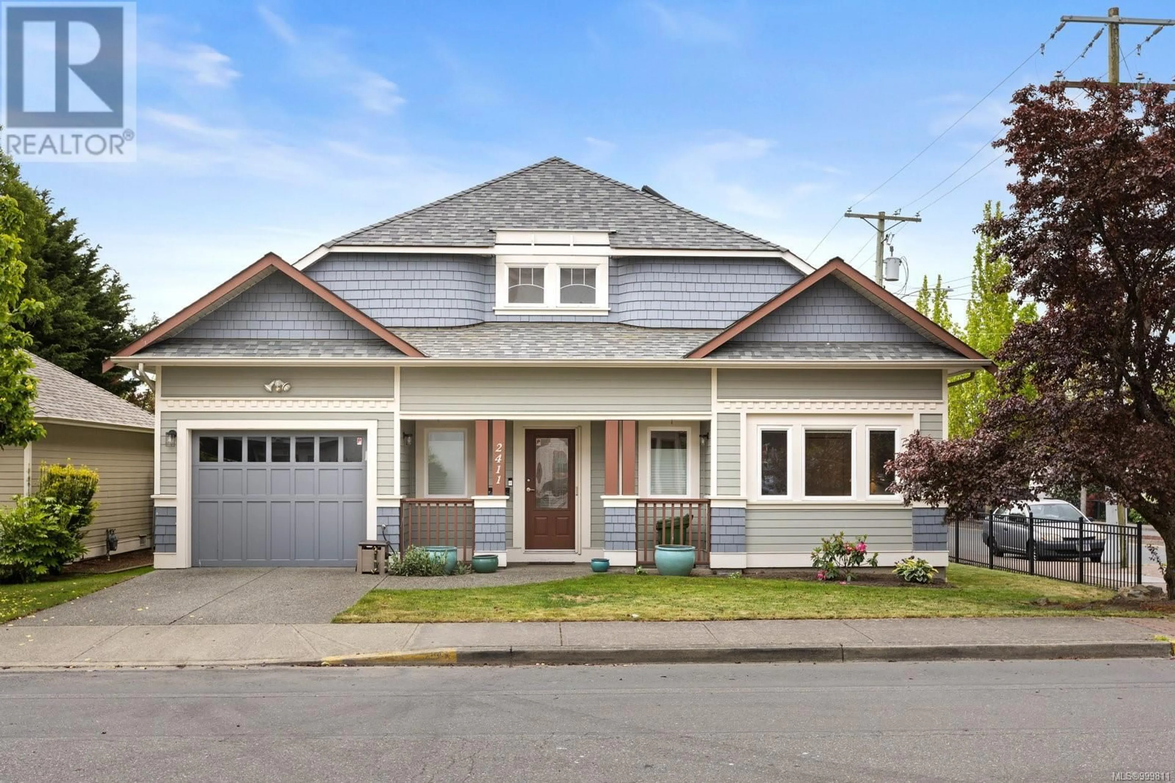 Home with vinyl exterior material, street for 2411 OAKVILLE AVENUE, Sidney British Columbia V8L1V8