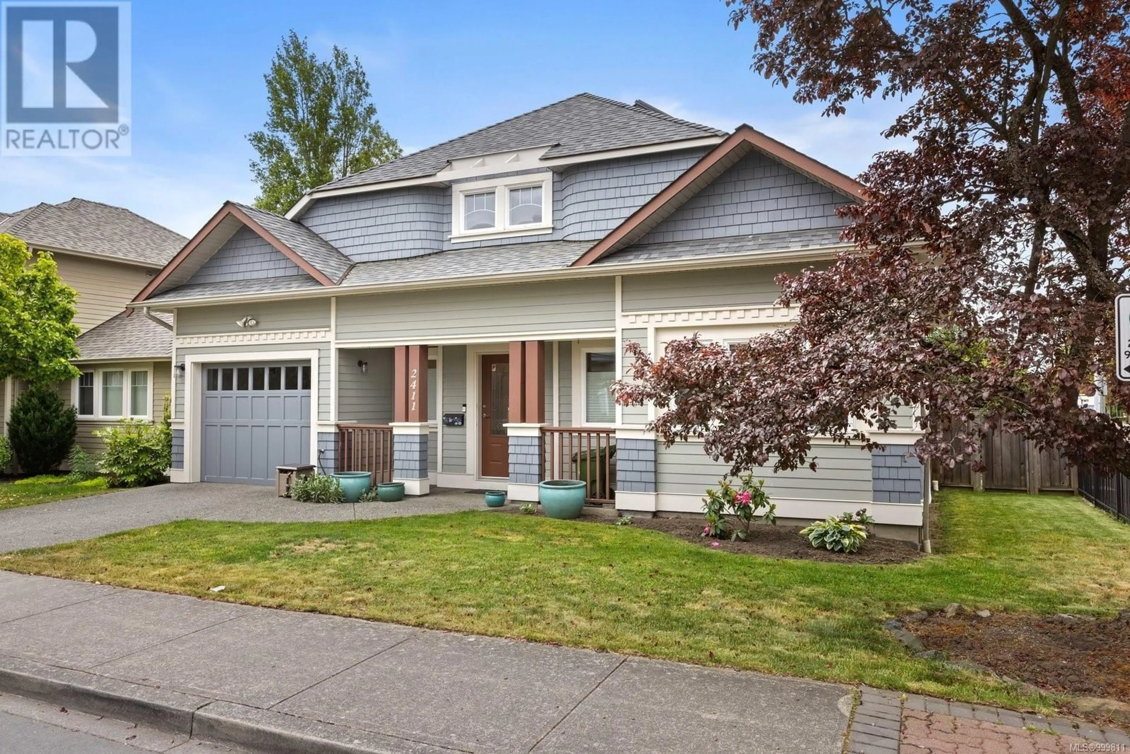 Home with vinyl exterior material, street for 2411 OAKVILLE AVENUE, Sidney British Columbia V8L1V8