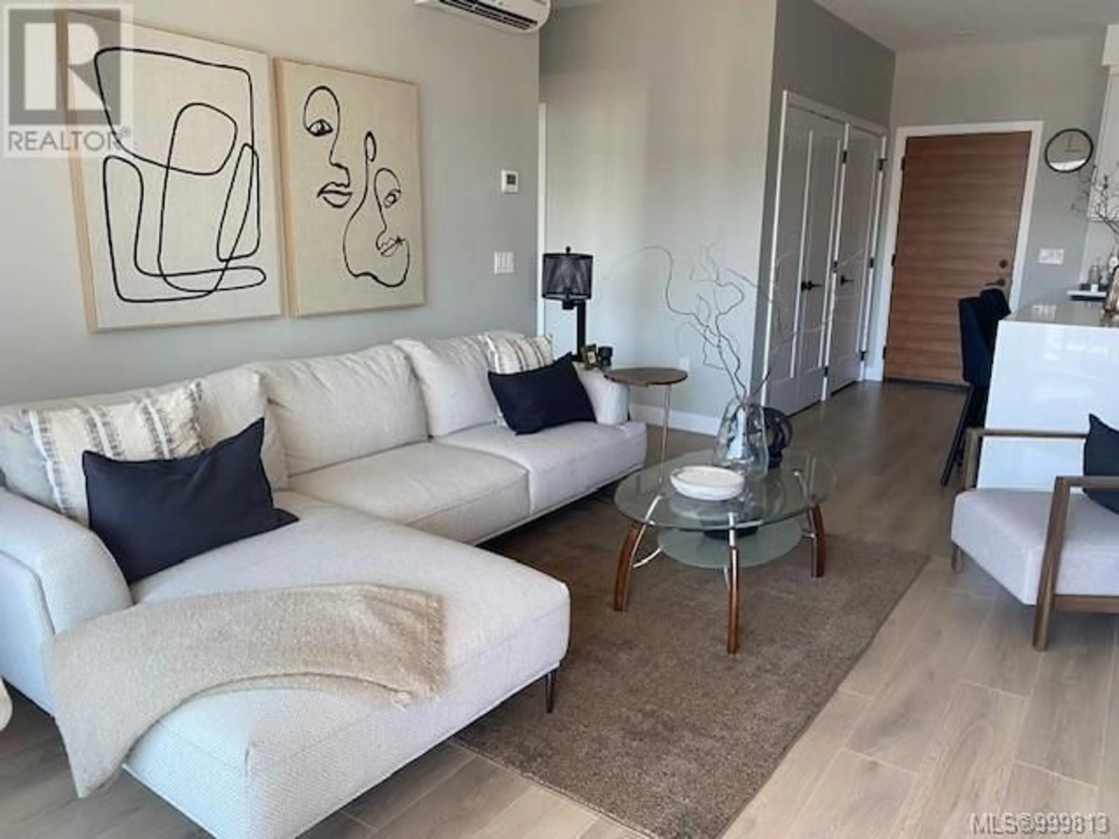 Living room with furniture, unknown for 402 - 967 WHIRLAWAY CRESCENT, Langford British Columbia V9B6W6