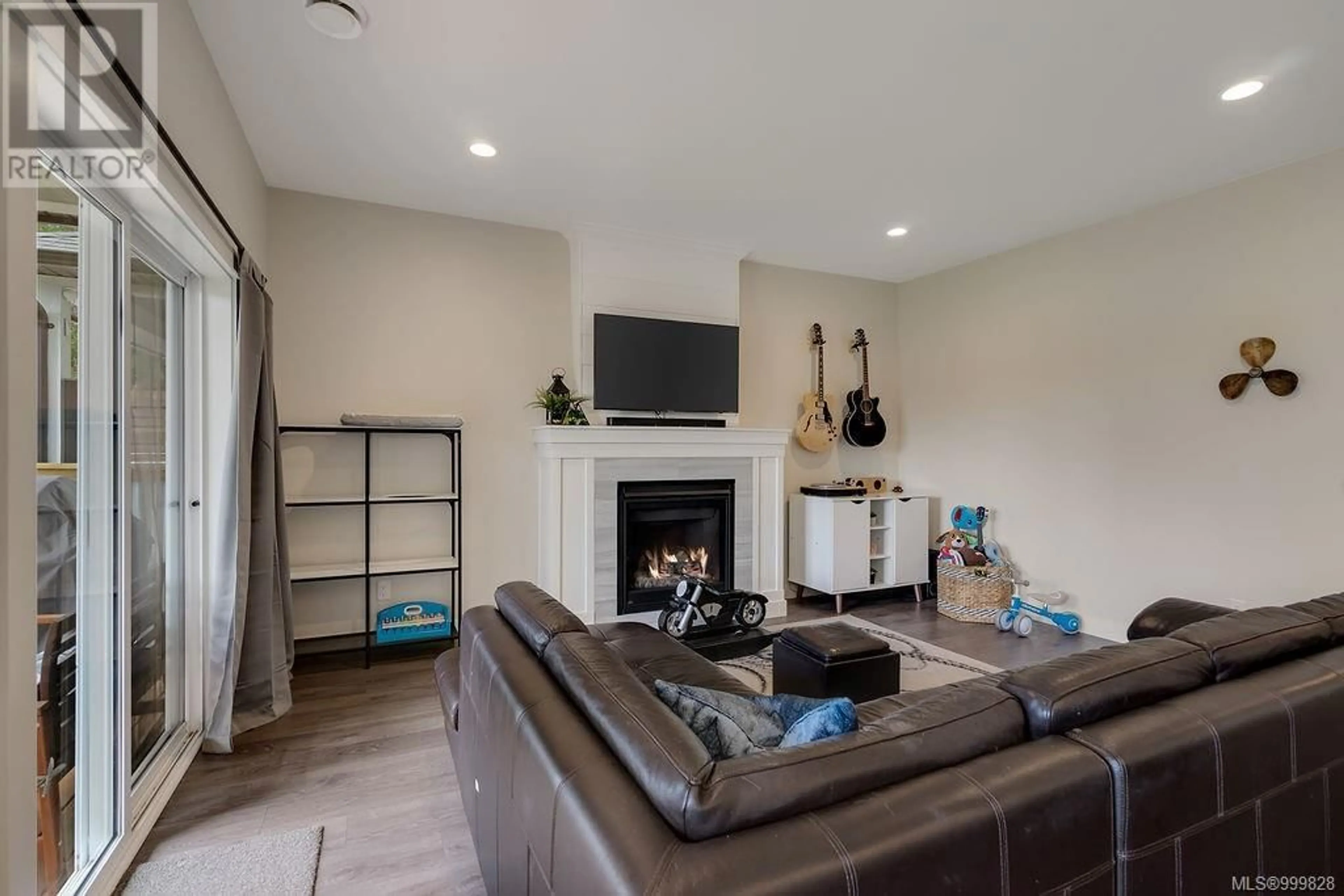 Living room with furniture, wood/laminate floor for 6899 BEATON ROAD, Sooke British Columbia V9Z0M3