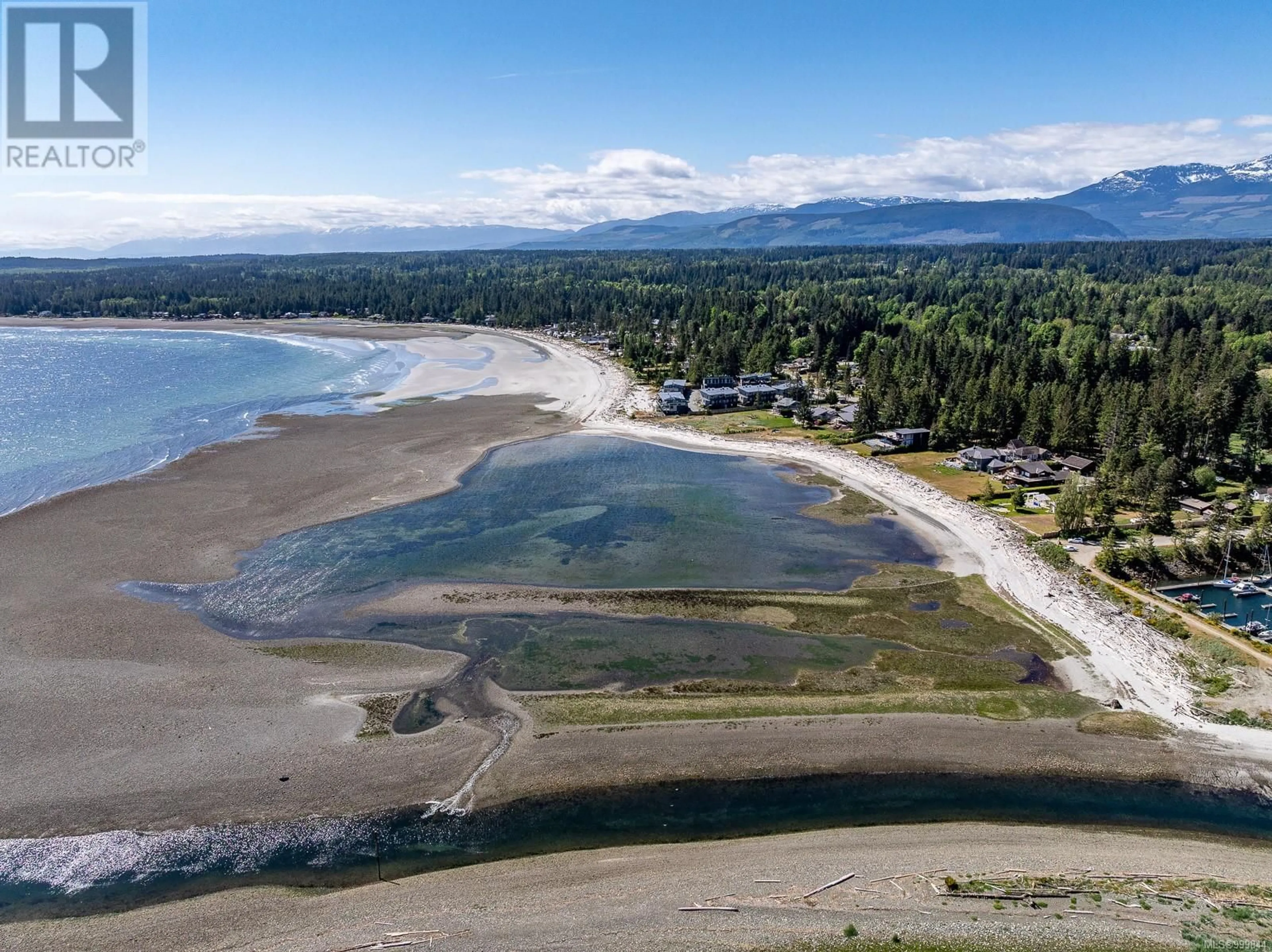 A pic from outside/outdoor area/front of a property/back of a property/a pic from drone, water/lake/river/ocean view for 9074 CLARKSON AVENUE, Black Creek British Columbia V9J1B3