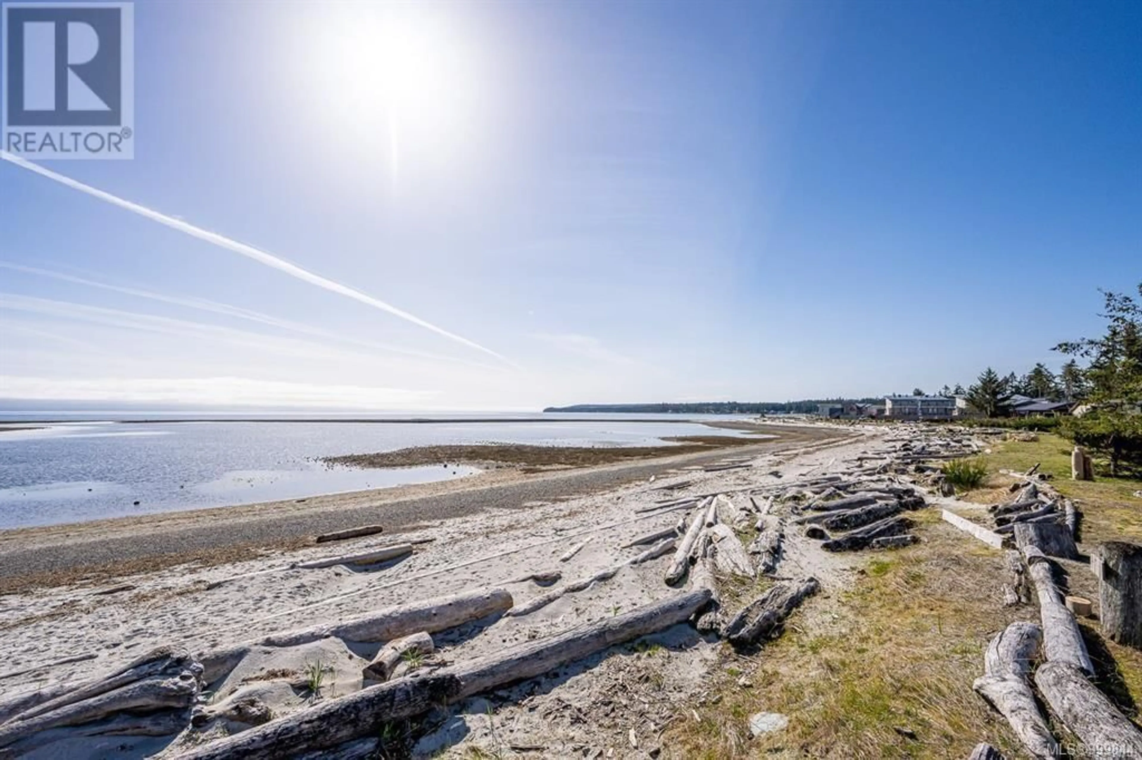 A pic from outside/outdoor area/front of a property/back of a property/a pic from drone, water/lake/river/ocean view for 9074 CLARKSON AVENUE, Black Creek British Columbia V9J1B3