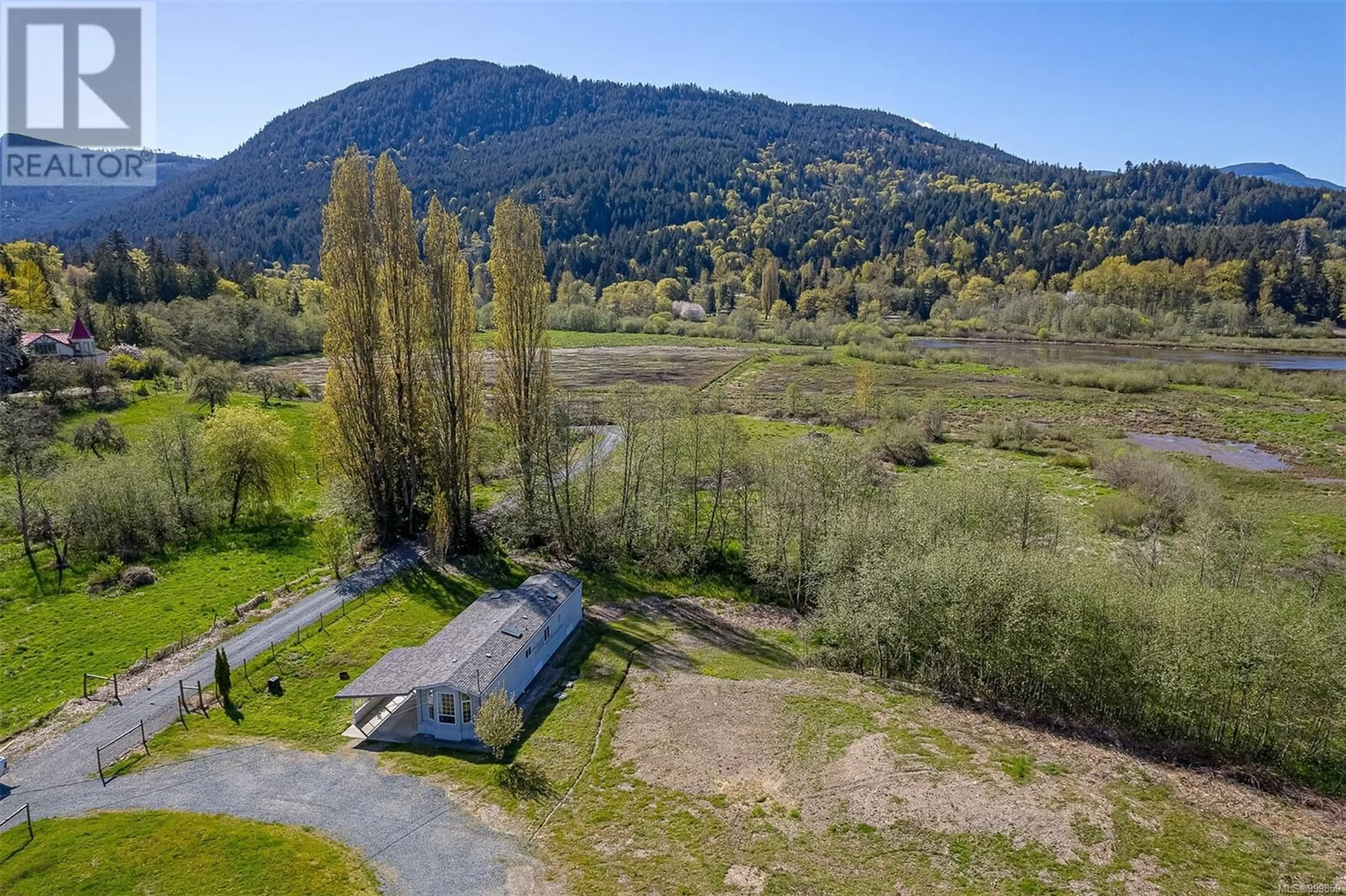 A pic from outside/outdoor area/front of a property/back of a property/a pic from drone, water/lake/river/ocean view for 7600 WESTHOLME ROAD, Duncan British Columbia V9L6B4