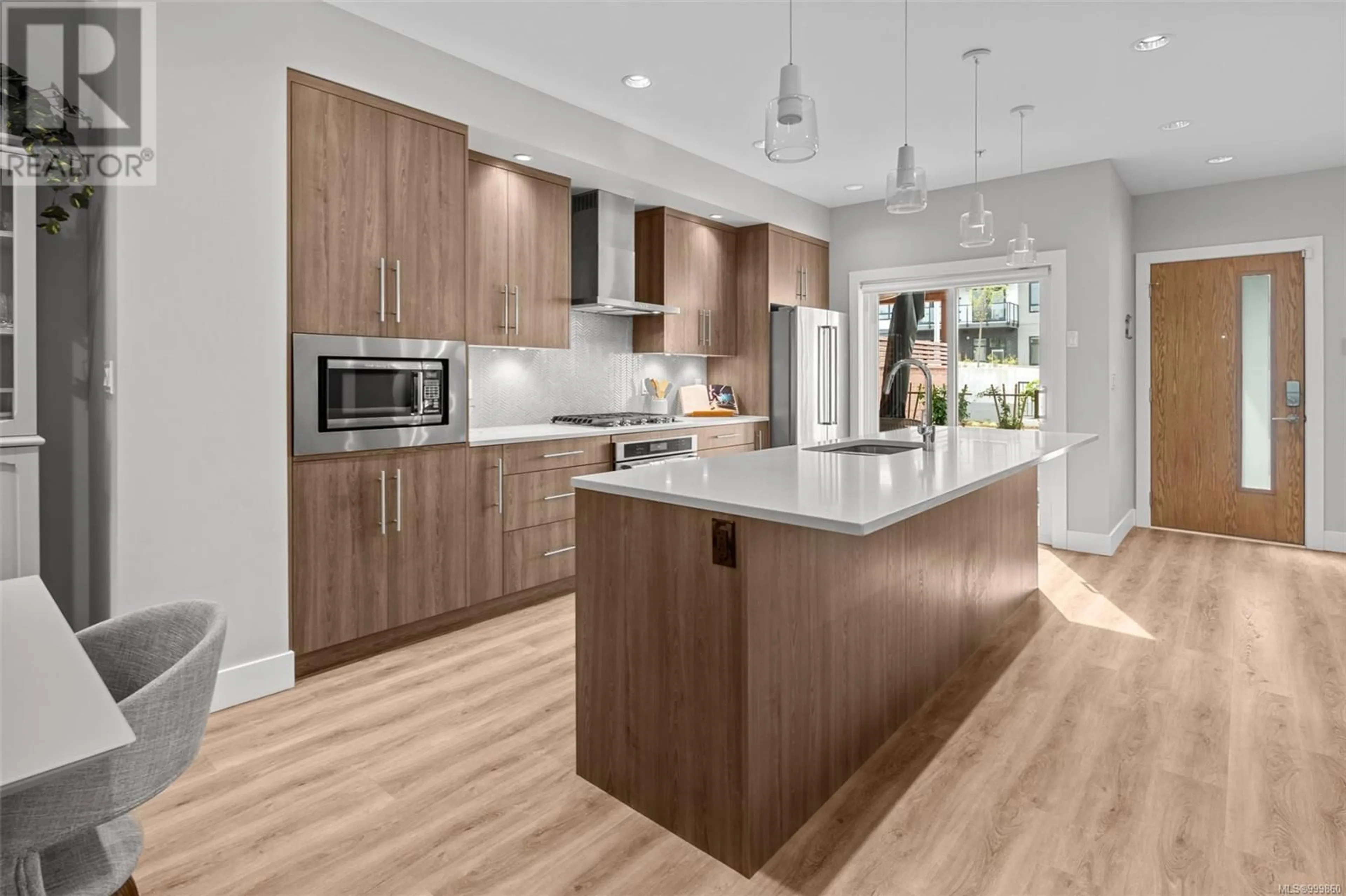 Contemporary kitchen, wood/laminate floor for 7884 LOCHSIDE DRIVE, Central Saanich British Columbia V8M2B9