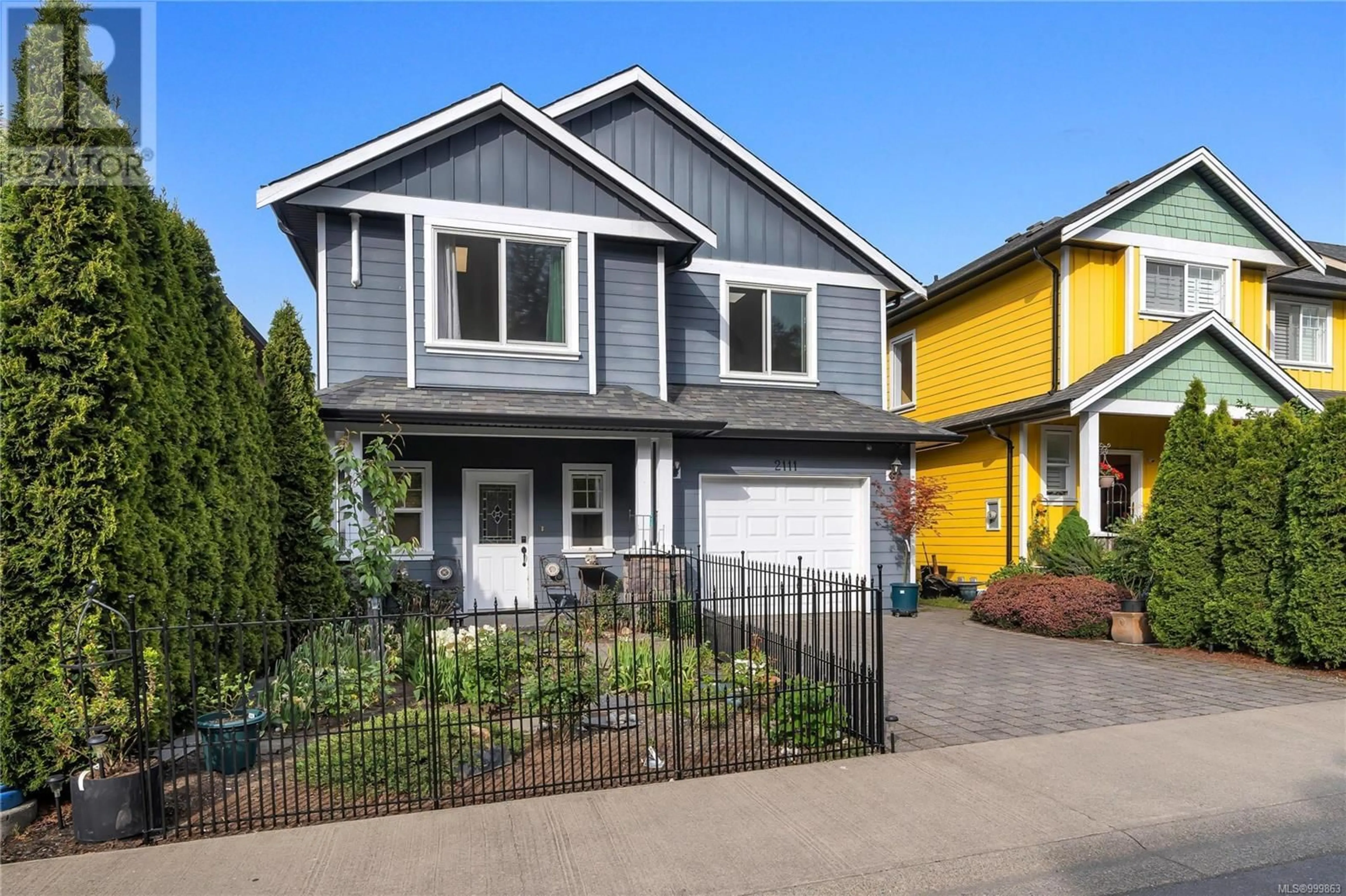 Home with vinyl exterior material, street for 2111 LONGSPUR DRIVE, Langford British Columbia V9B0E7