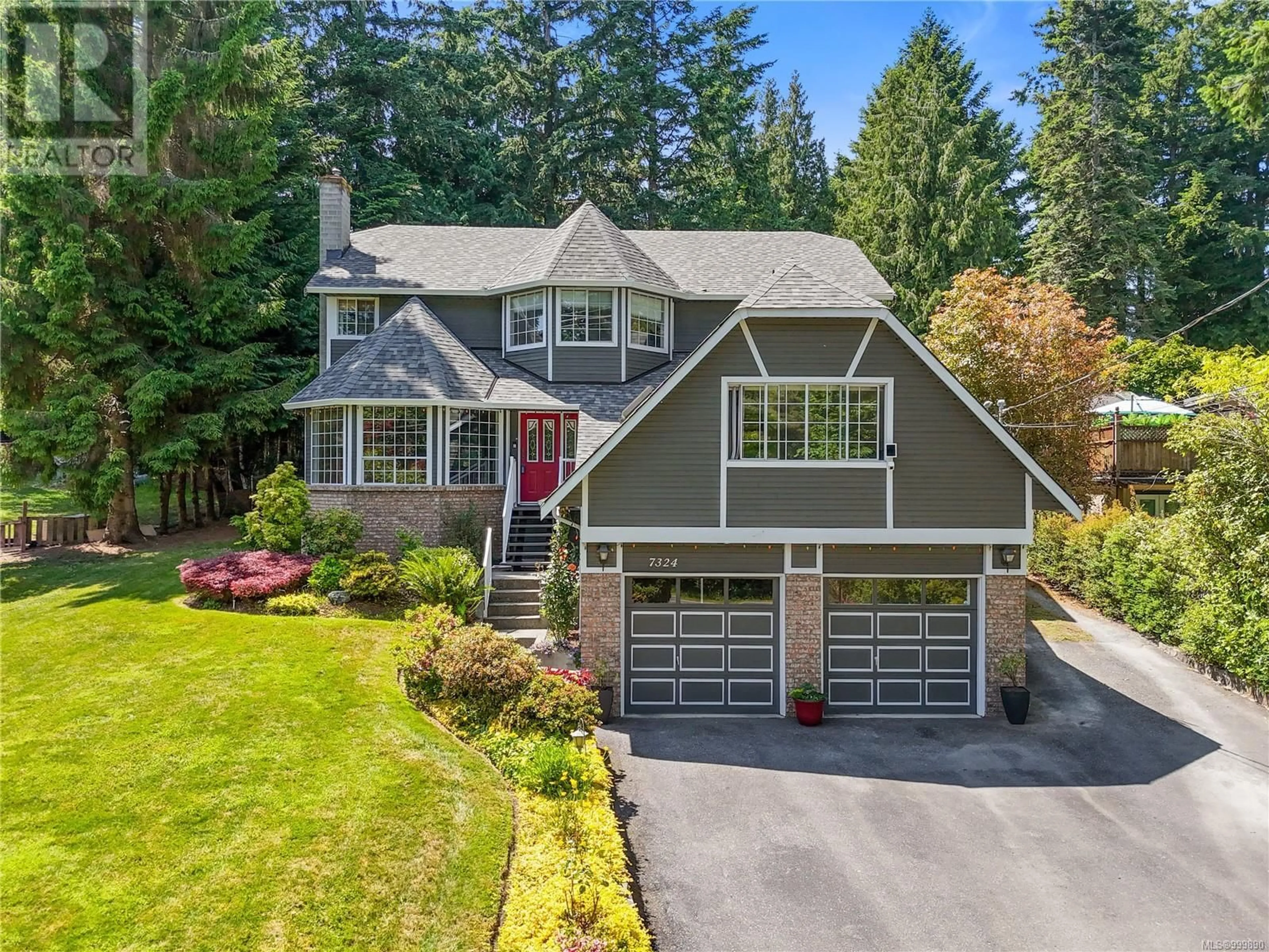 Home with vinyl exterior material, street for 7324 VEYANESS ROAD, Central Saanich British Columbia V8M1S9