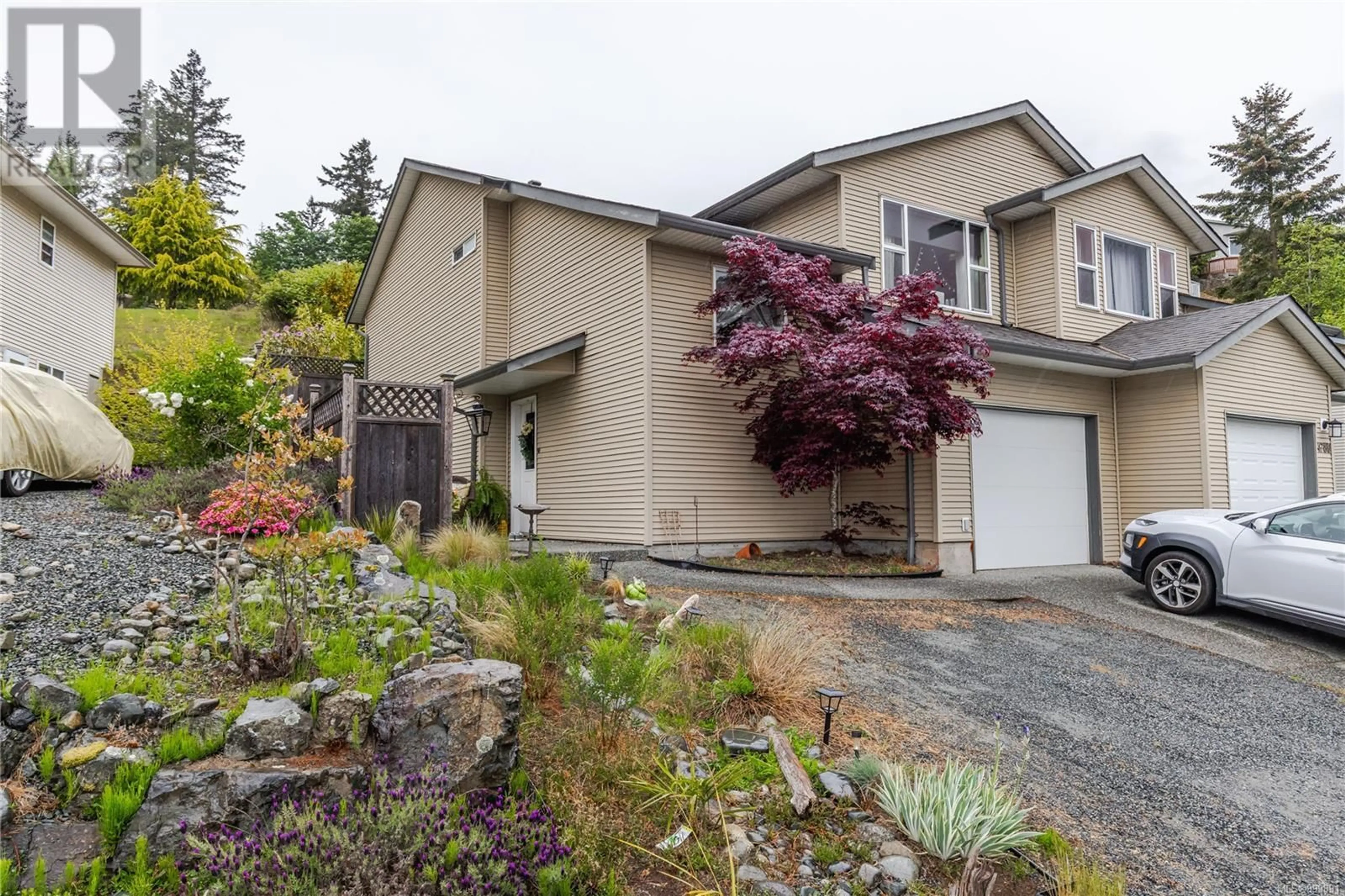 Home with vinyl exterior material, street for 4782 FAIRBROOK CRESCENT, Nanaimo British Columbia V9T6M6